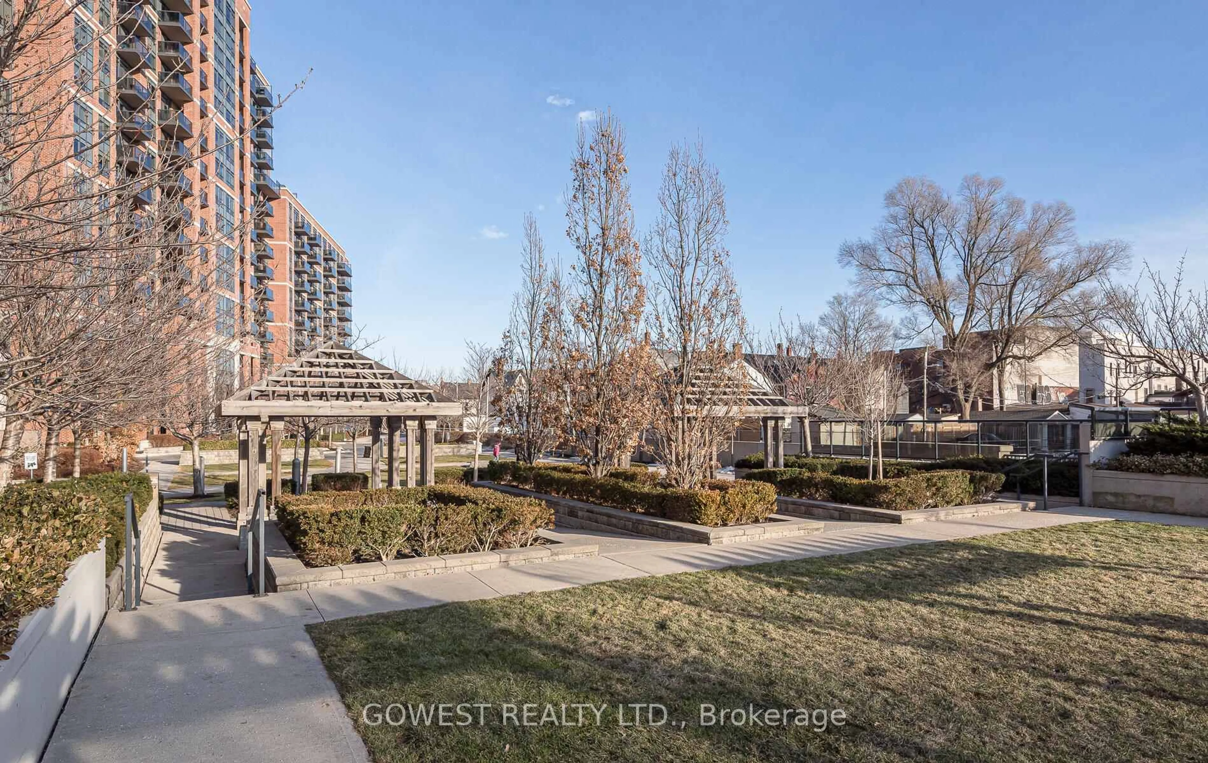 Patio, city buildings view from balcony for 61 Heintzman St #1305, Toronto Ontario M6P 5A2