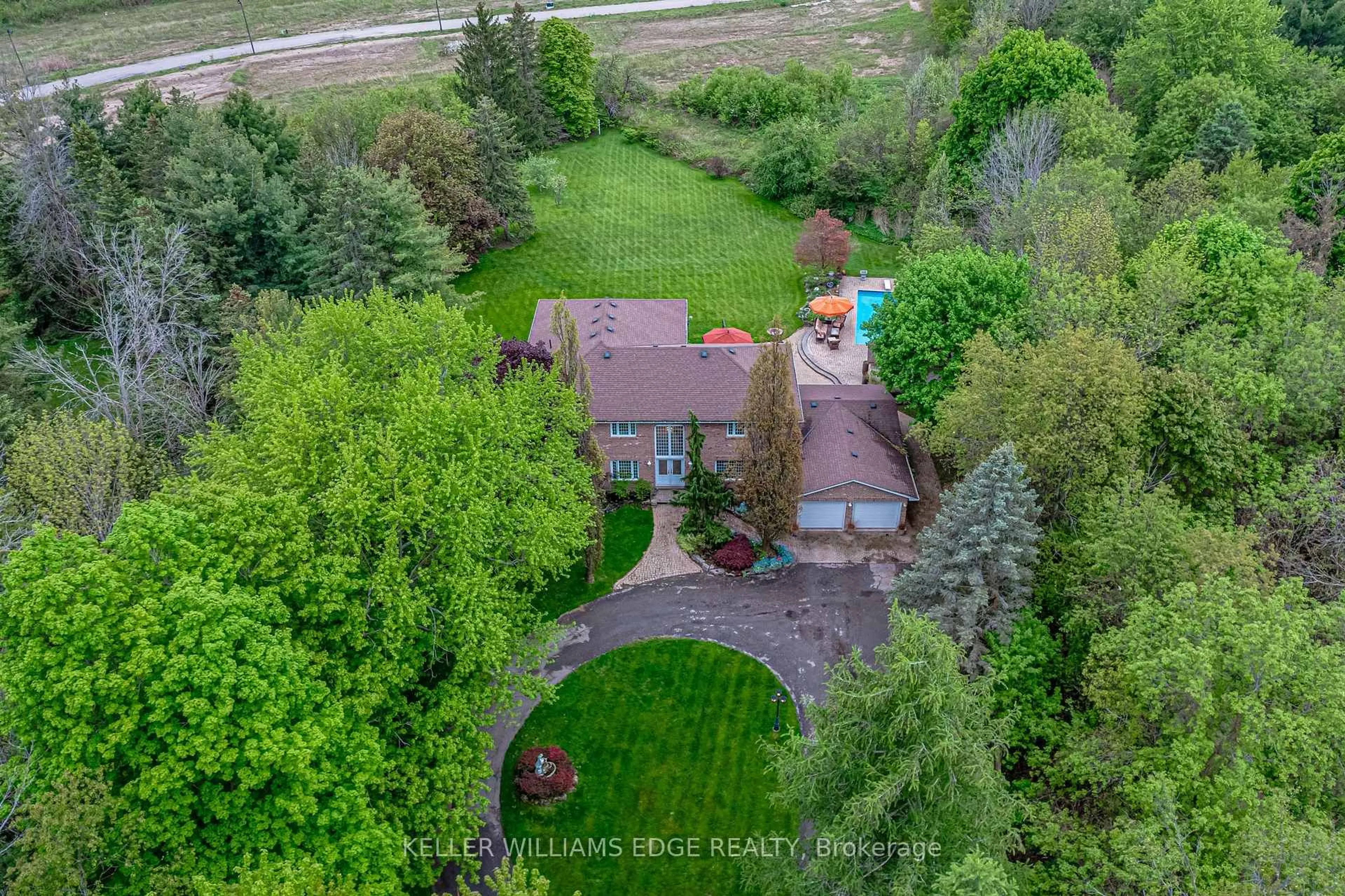 A pic from outside/outdoor area/front of a property/back of a property/a pic from drone, unknown for 57 Kennedy Rd, Caledon Ontario L7C 2M7