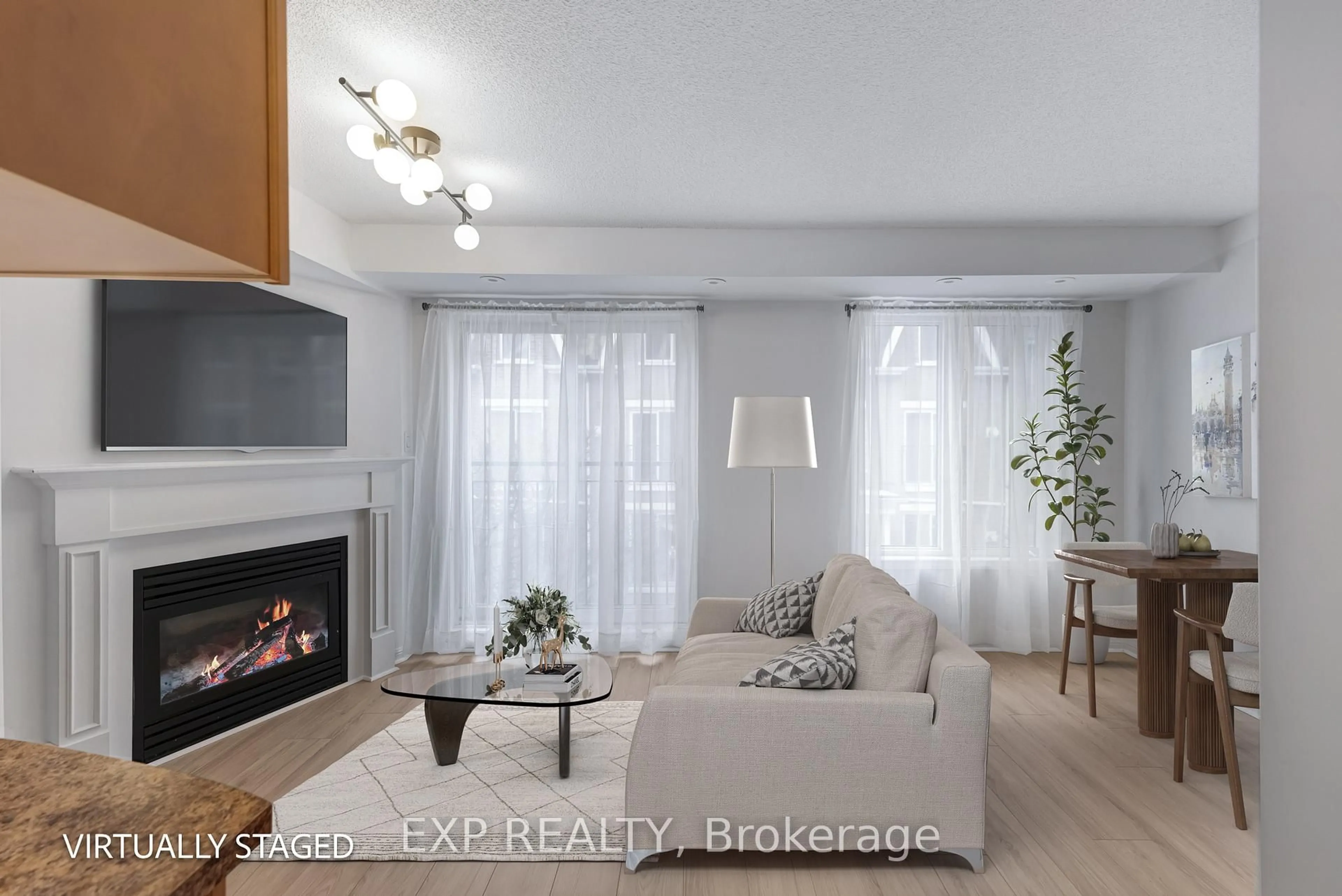 Living room with furniture, wood/laminate floor for 12 Laidlaw St #806, Toronto Ontario M6K 1X2