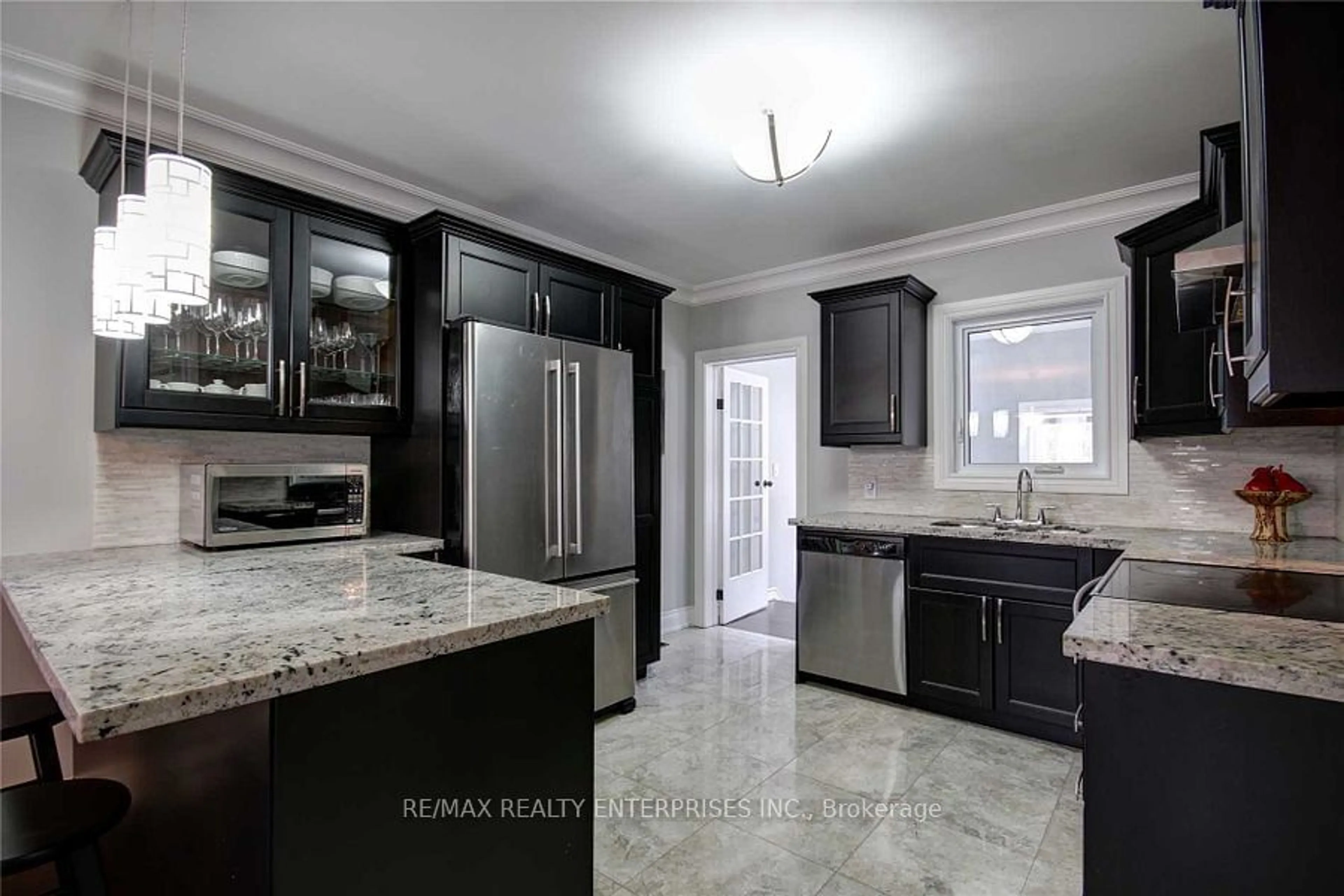 Open concept kitchen, ceramic/tile floor for 96 Manitoba St, Toronto Ontario M8Y 1C9