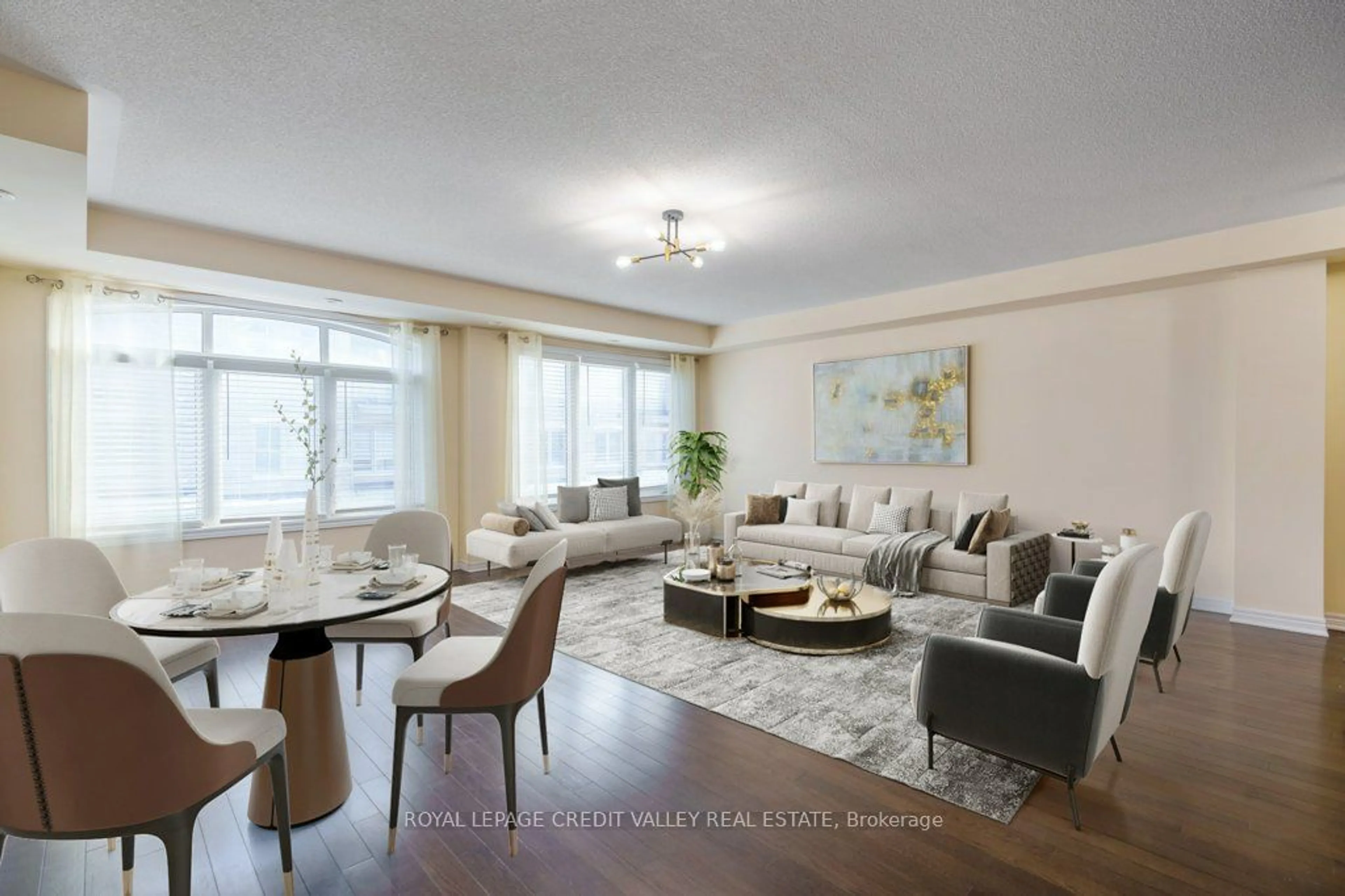 Living room with furniture, wood/laminate floor for 200 Veterans Dr #34, Brampton Ontario L7A 4S6