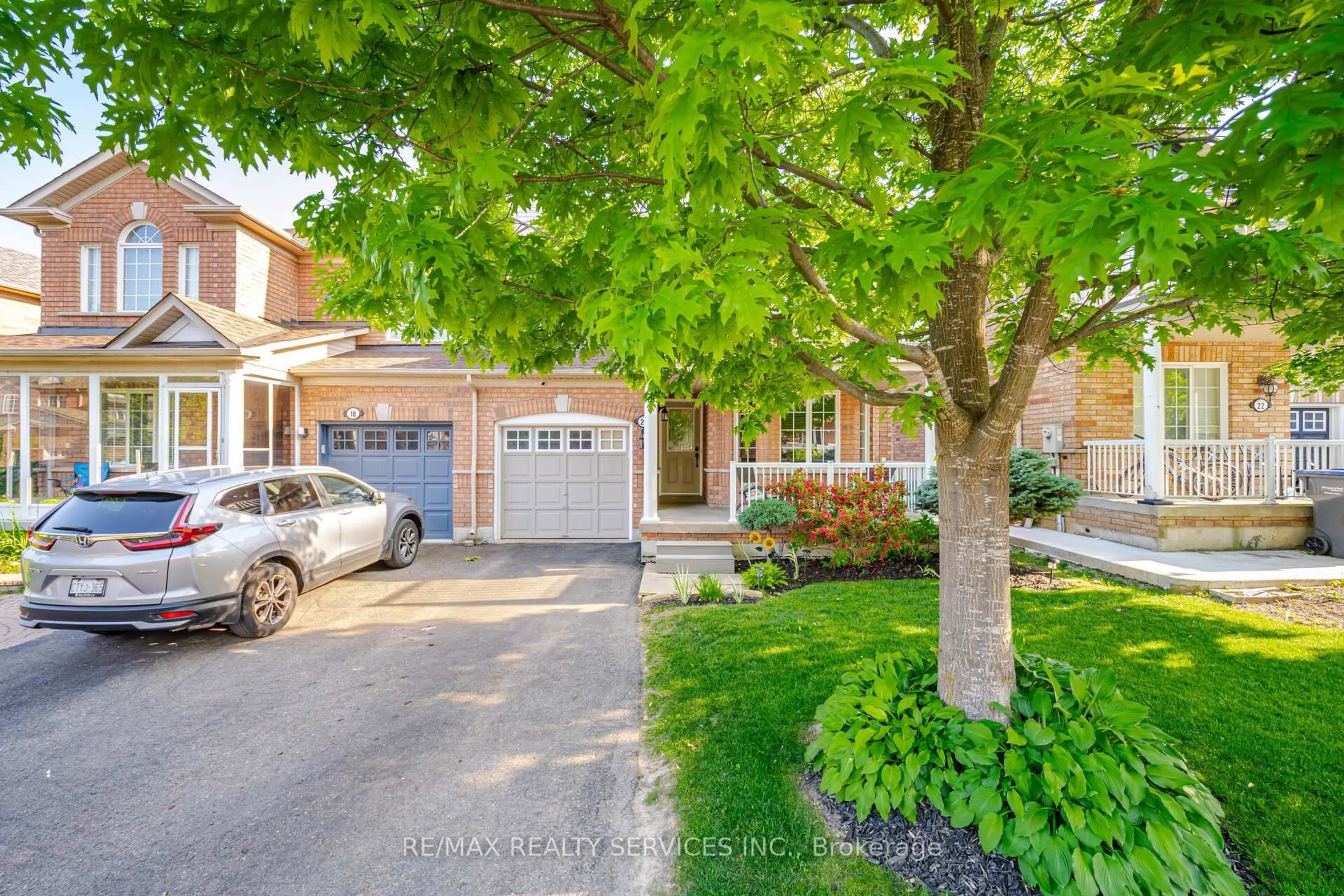 A pic from outside/outdoor area/front of a property/back of a property/a pic from drone, street for 20 Topiary Lane, Brampton Ontario L7A 2K6