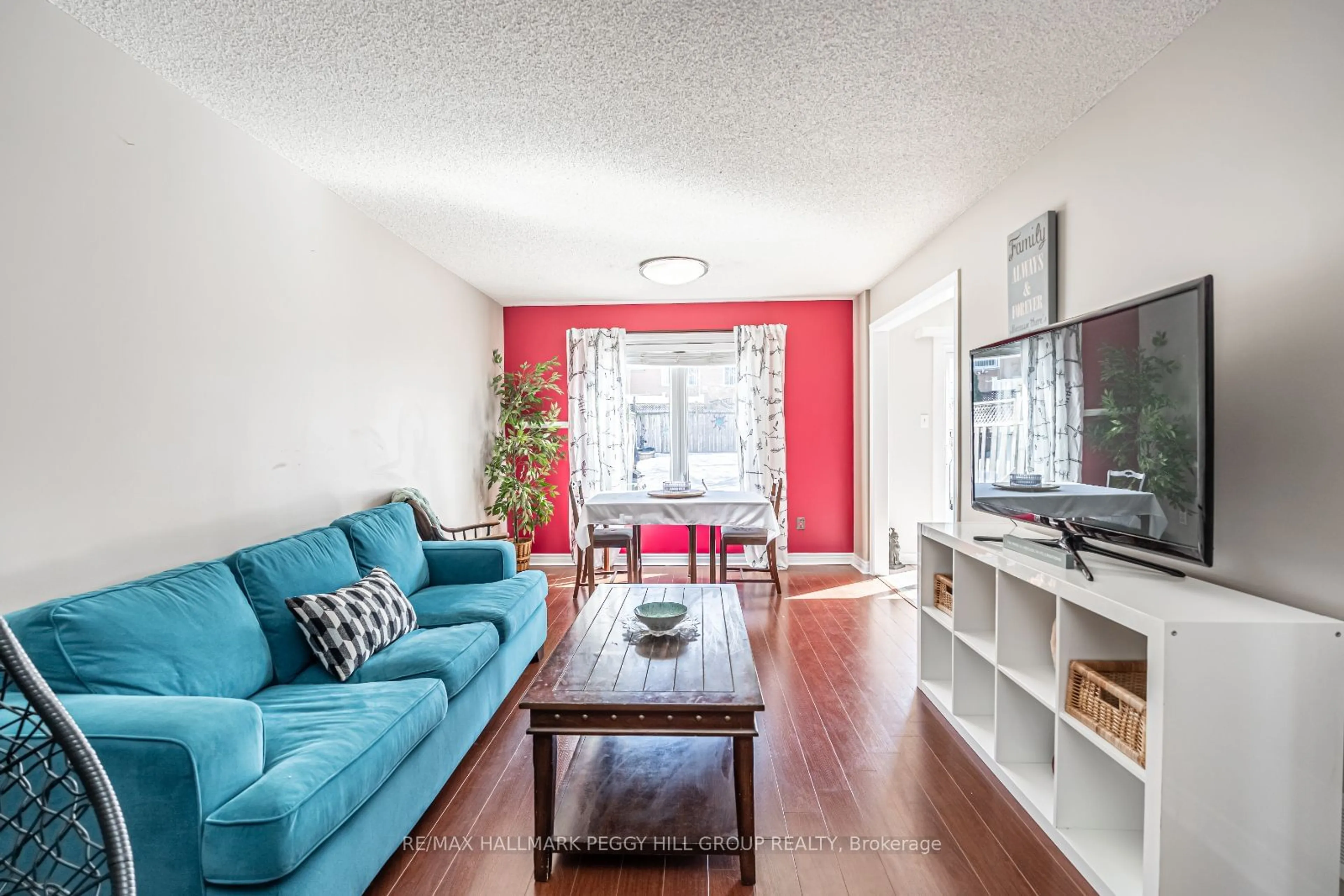 Living room with furniture, wood/laminate floor for 8 Rolling Hills Lane, Caledon Ontario L7E 1T9