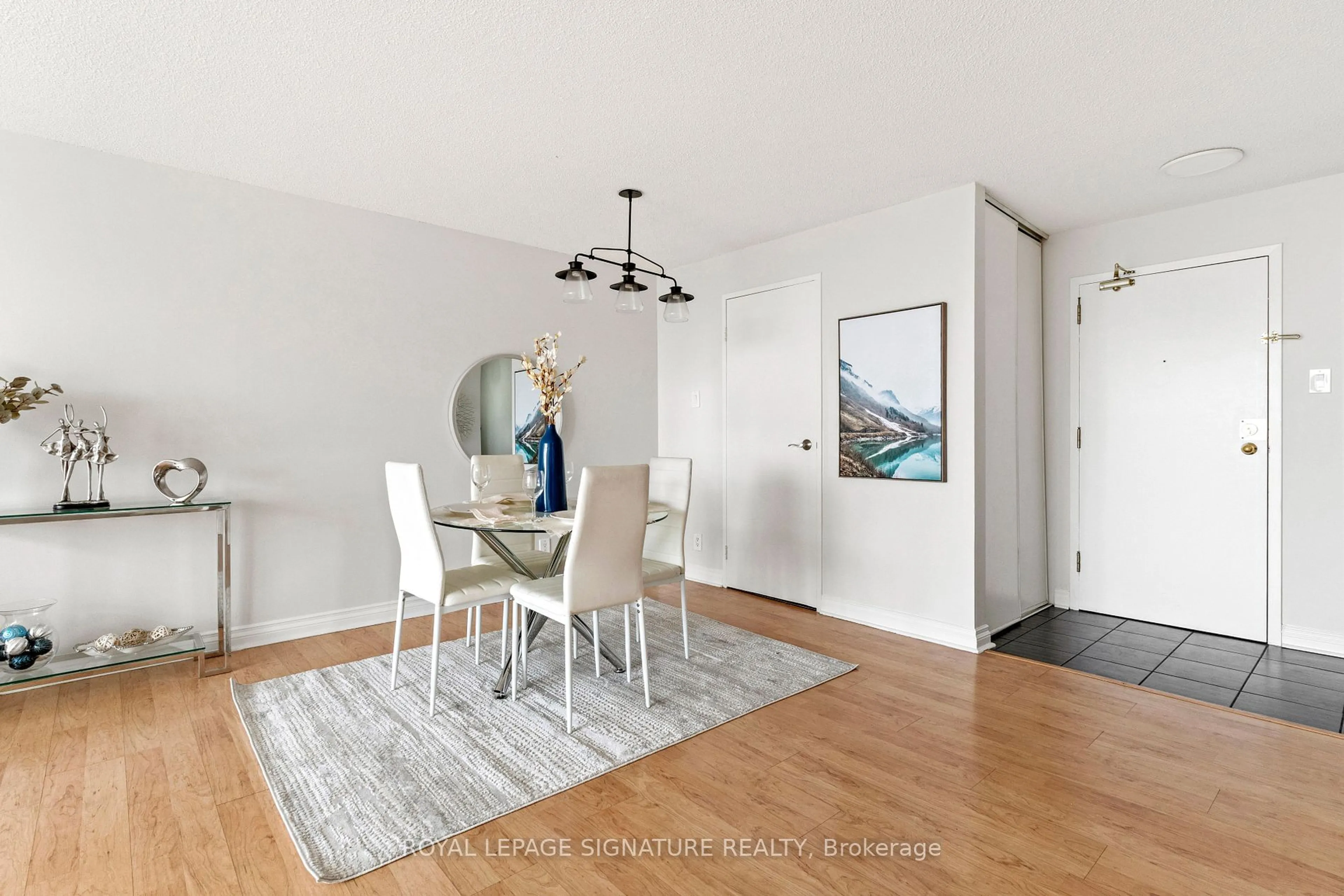 Dining room, wood/laminate floor for 35 Trailwood Dr #1218, Mississauga Ontario L4Z 3K9