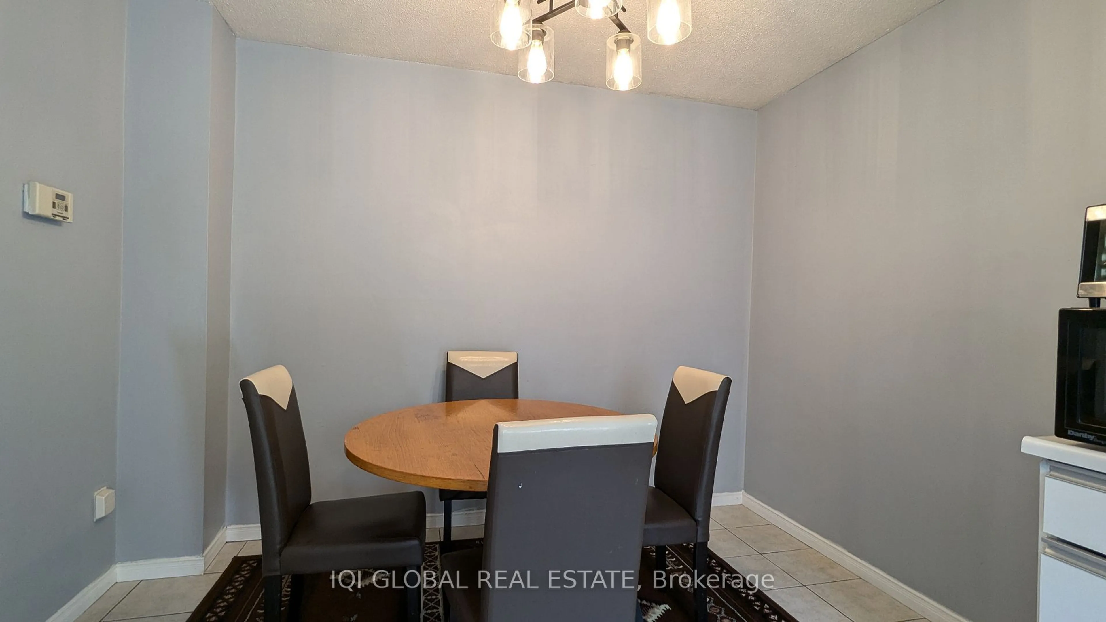 Dining room, wood/laminate floor for 2004 Martin Grove Rd #15, Toronto Ontario M9V 4A3