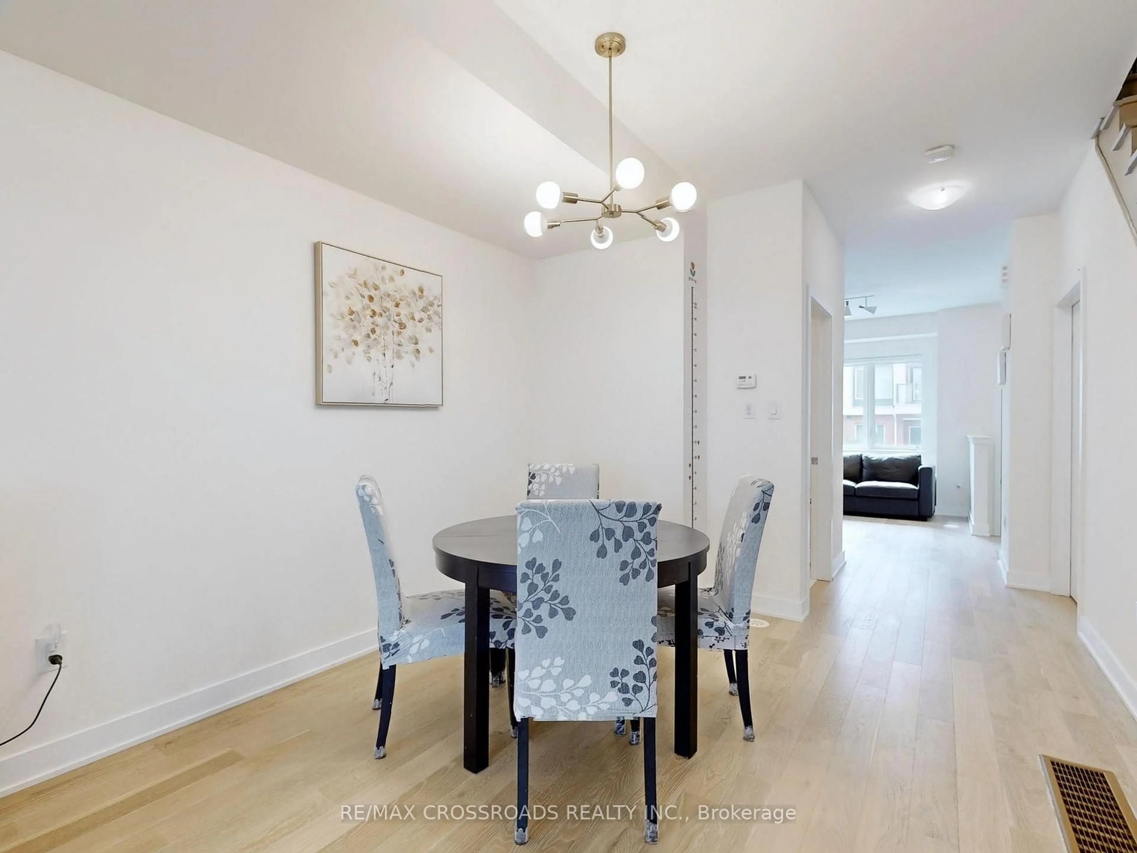 Dining room, wood/laminate floor for 73 William Duncan Rd, Toronto Ontario M3K 0C5