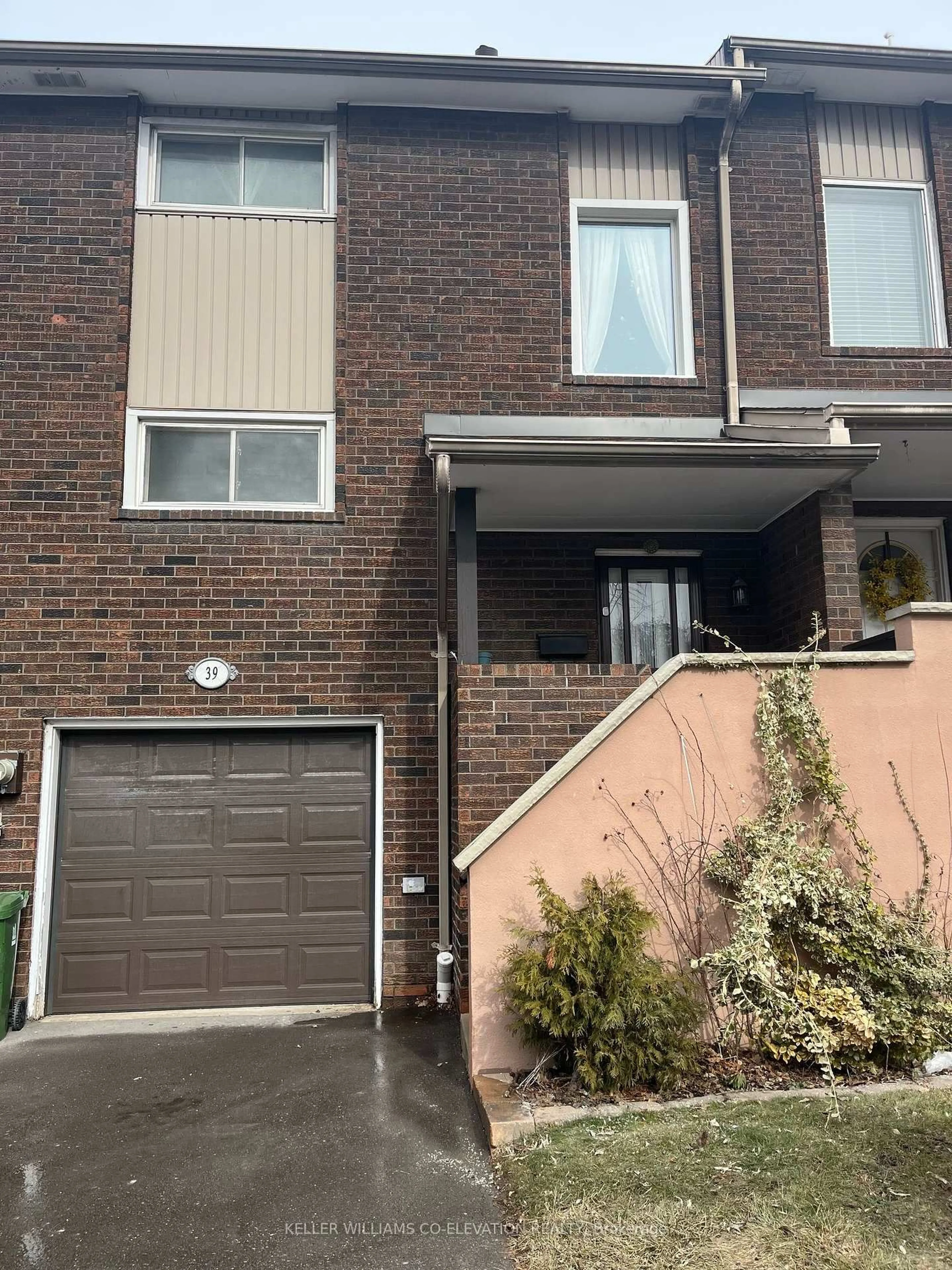 Home with brick exterior material, street for 39 Permfield Path #33, Toronto Ontario M9C 4Y5