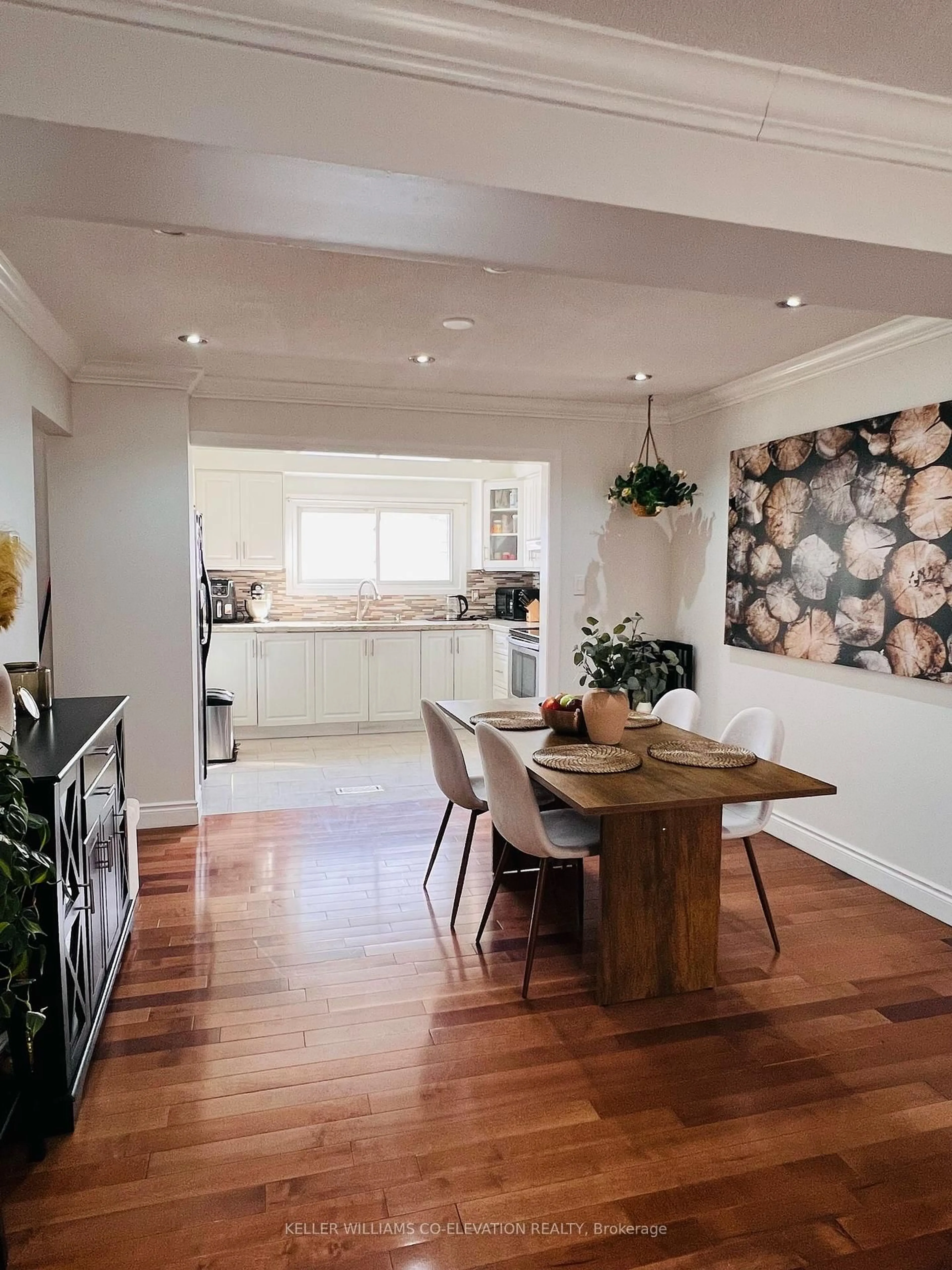 Dining room, wood/laminate floor for 39 Permfield Path #33, Toronto Ontario M9C 4Y5