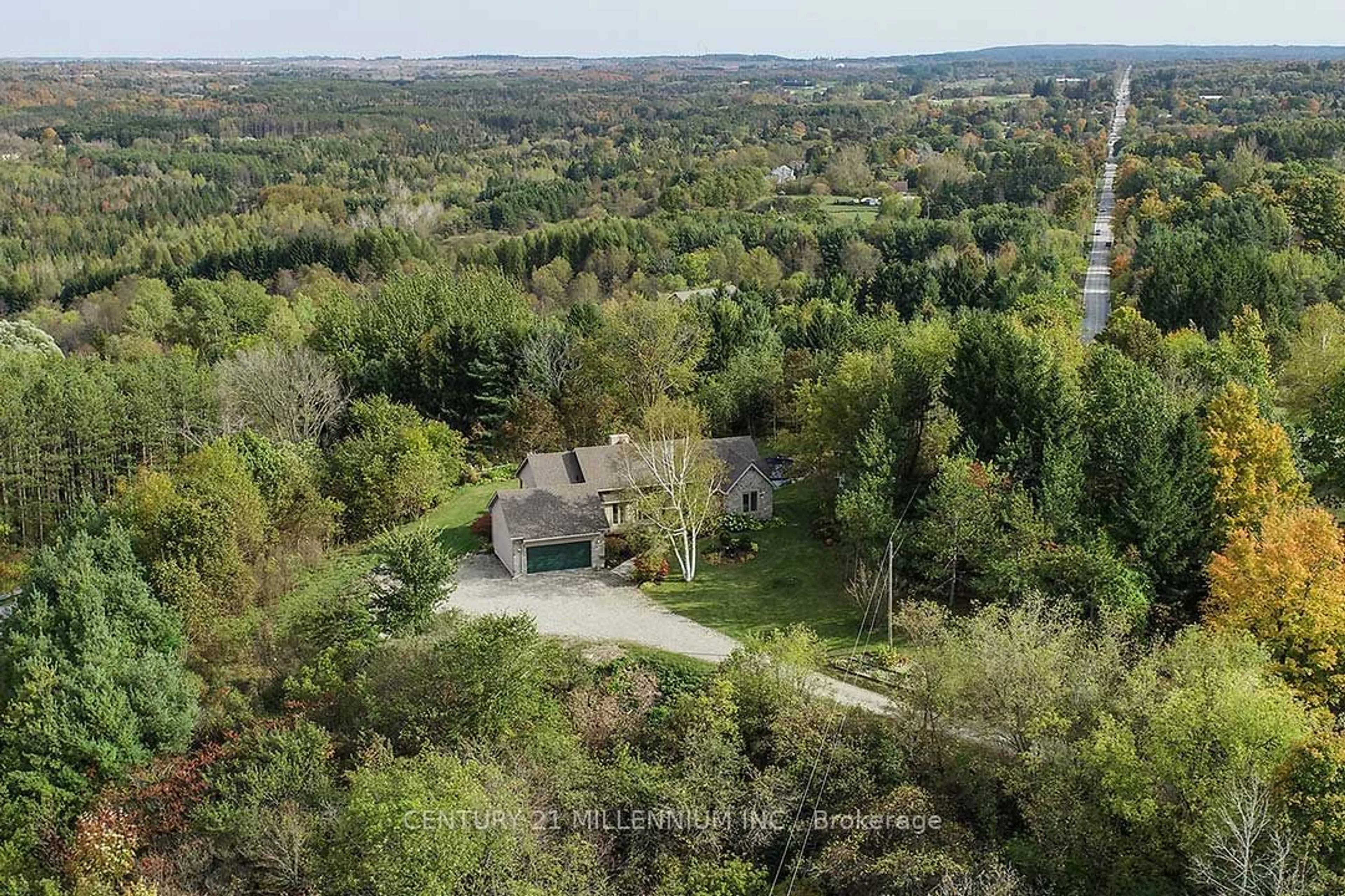 A pic from outside/outdoor area/front of a property/back of a property/a pic from drone, forest/trees view for 20334 Main St, Caledon Ontario L7K 1P7