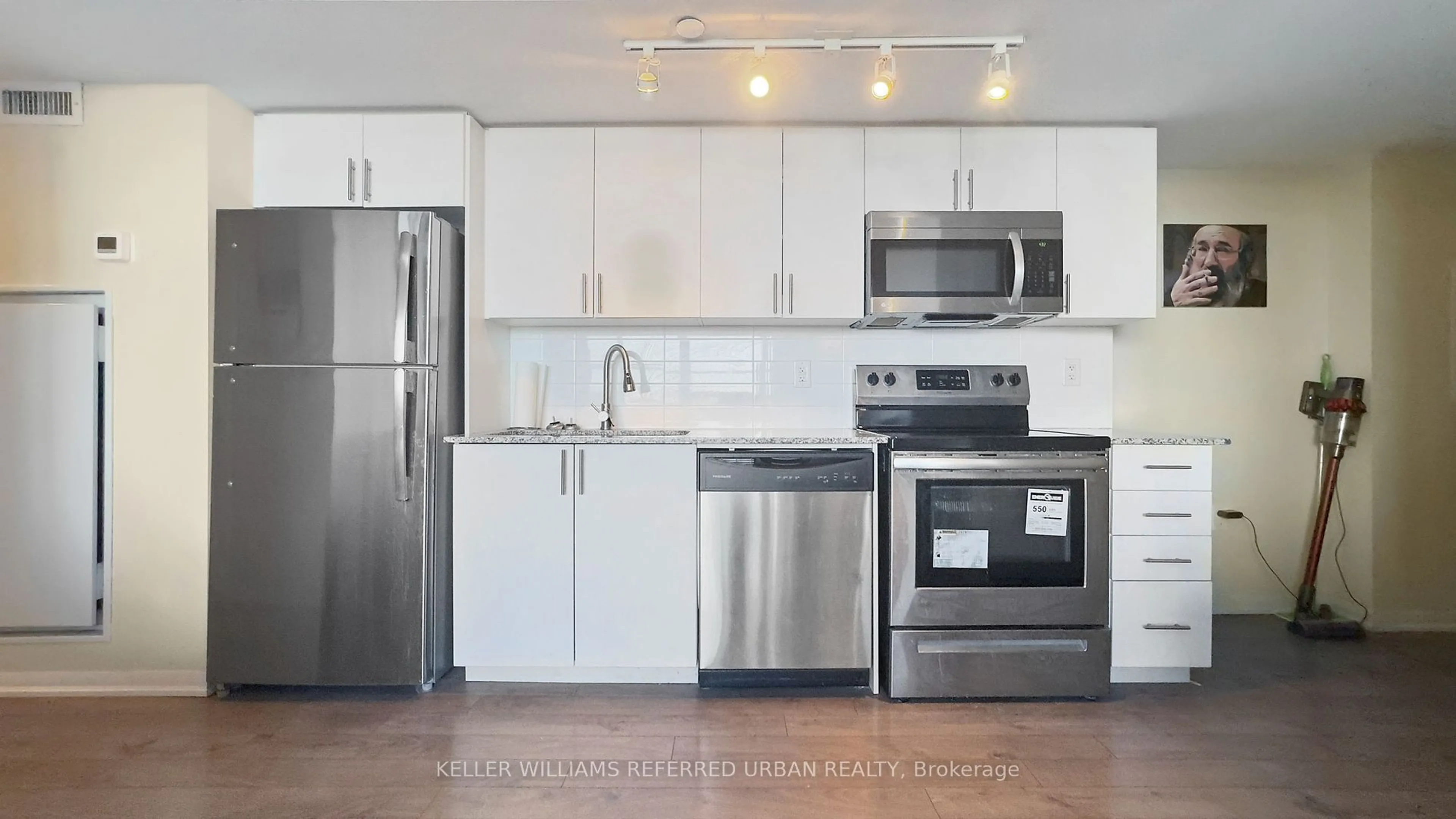 Standard kitchen, wood/laminate floor for 3091 Dufferin St #908, Toronto Ontario M6A 0C4