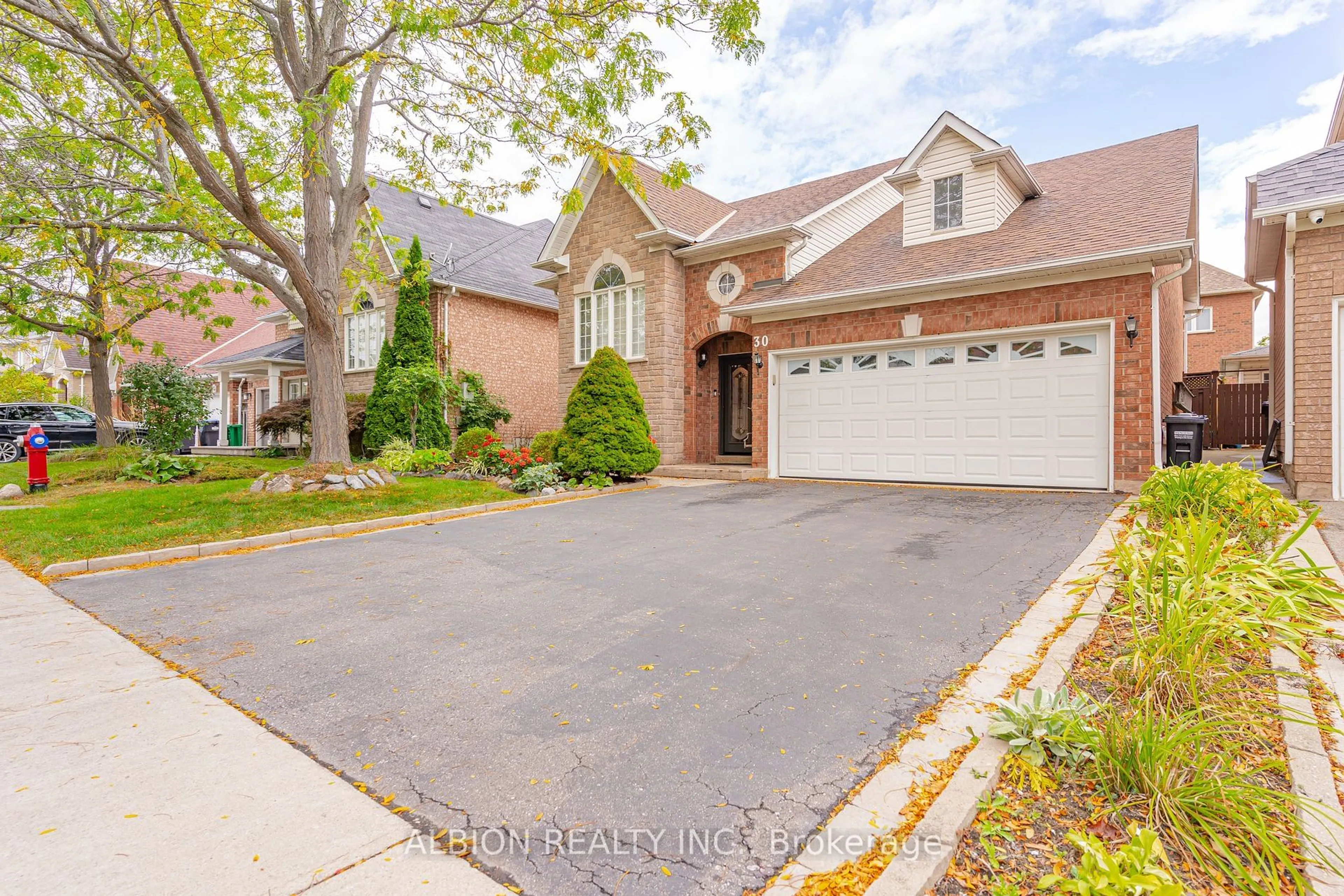 Home with brick exterior material, street for 30 Rushbrook Dr, Brampton Ontario L6P 1E4