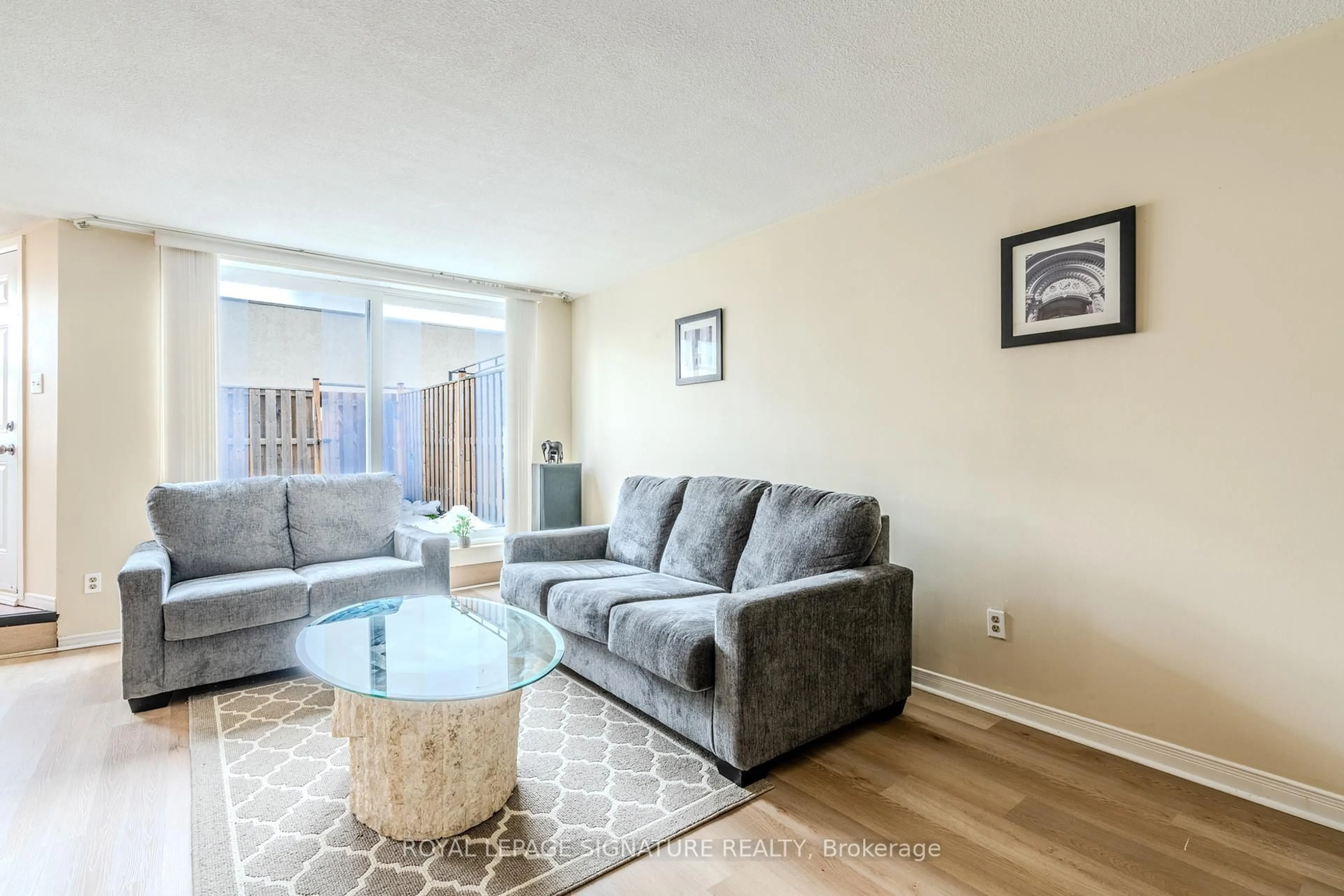 Living room with furniture, unknown for 3040 Constitution Blvd #153, Mississauga Ontario L4Y 3X7