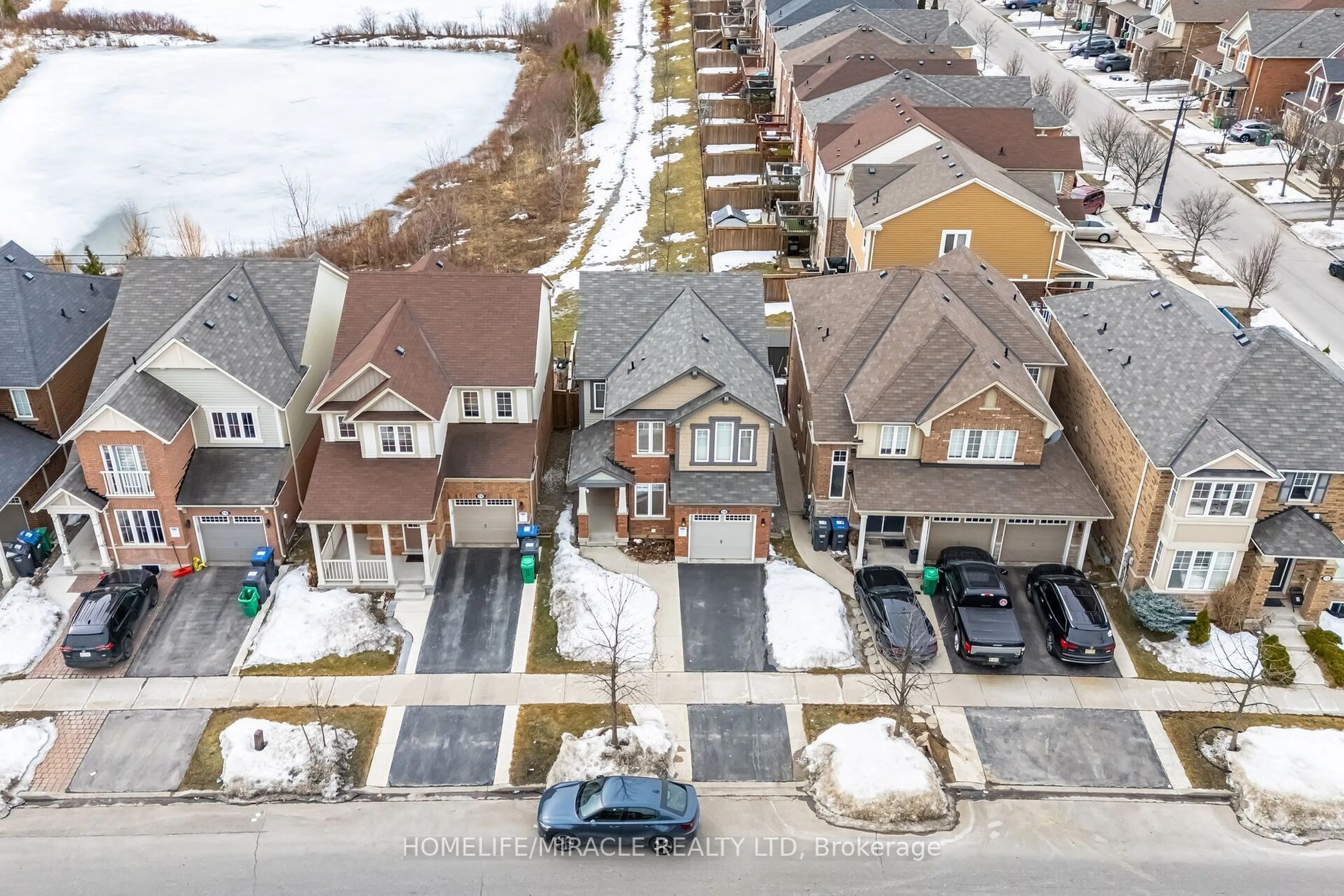 A pic from outside/outdoor area/front of a property/back of a property/a pic from drone, street for 14 Robert Parkinson Dr, Brampton Ontario L7A 0Y3