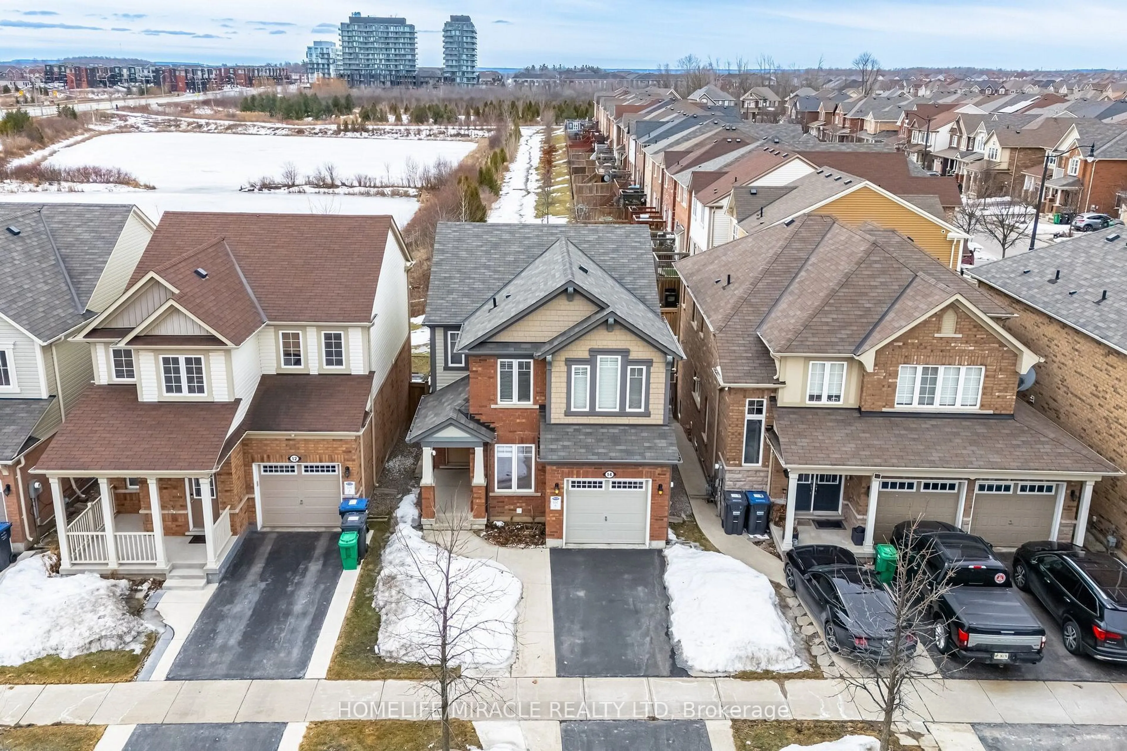 A pic from outside/outdoor area/front of a property/back of a property/a pic from drone, street for 14 Robert Parkinson Dr, Brampton Ontario L7A 0Y3