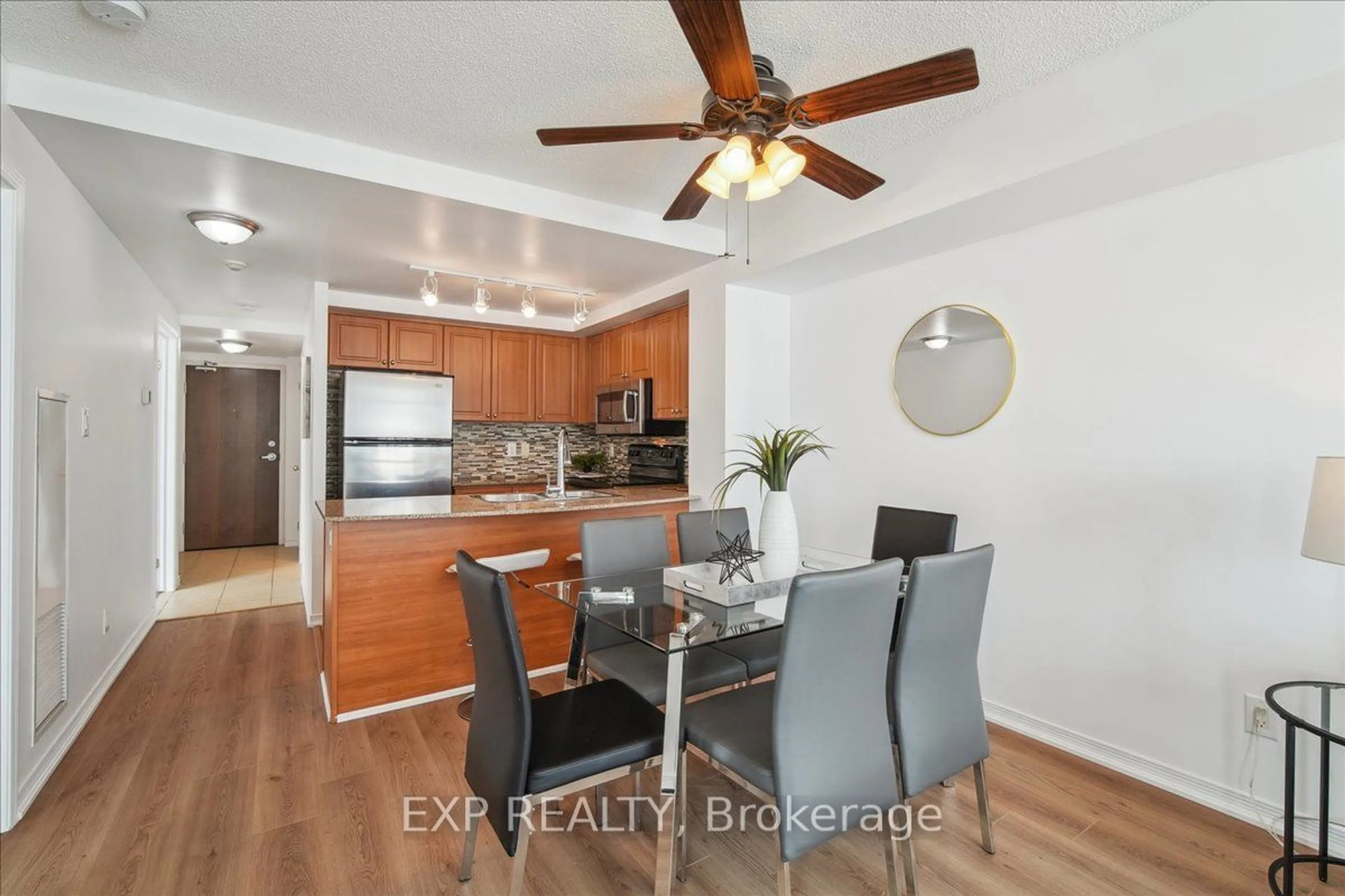 Open concept kitchen, wood/laminate floor for 9 George St #706, Brampton Ontario L6X 0T6