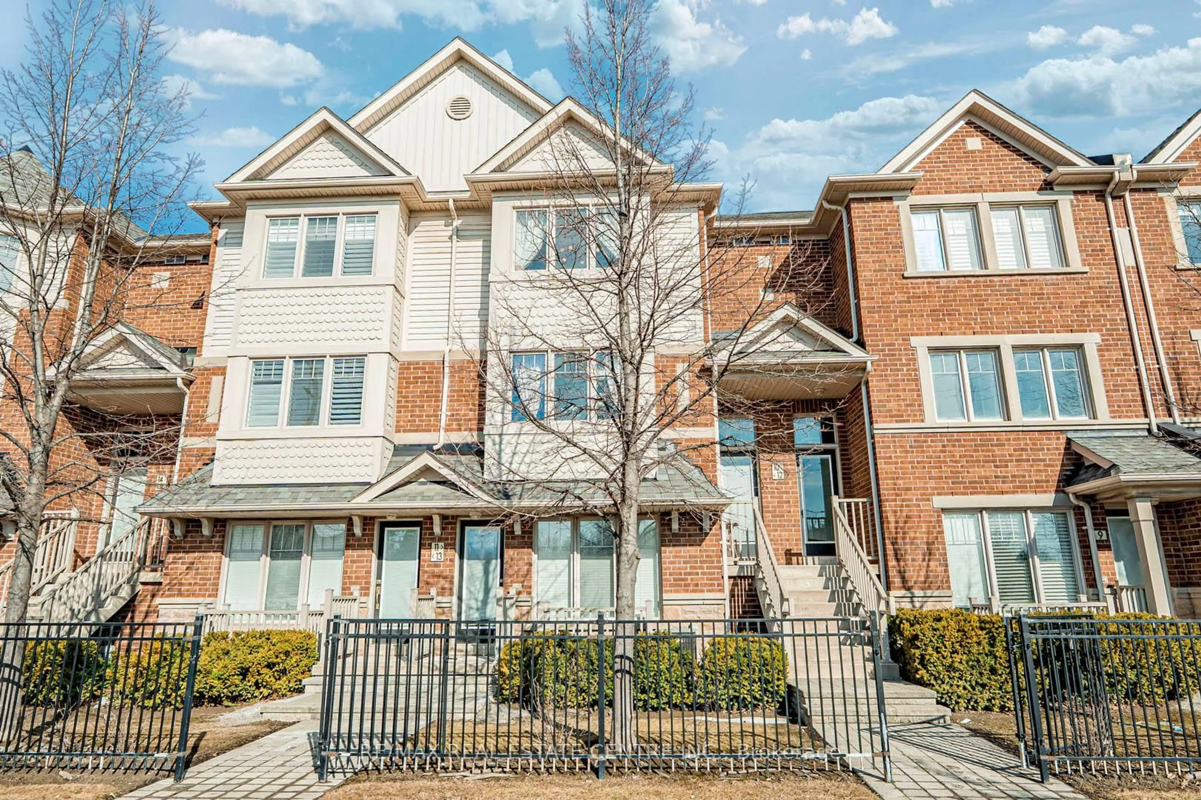 Home with brick exterior material, street for 3335 Thomas St #12, Mississauga Ontario L5M 0P7