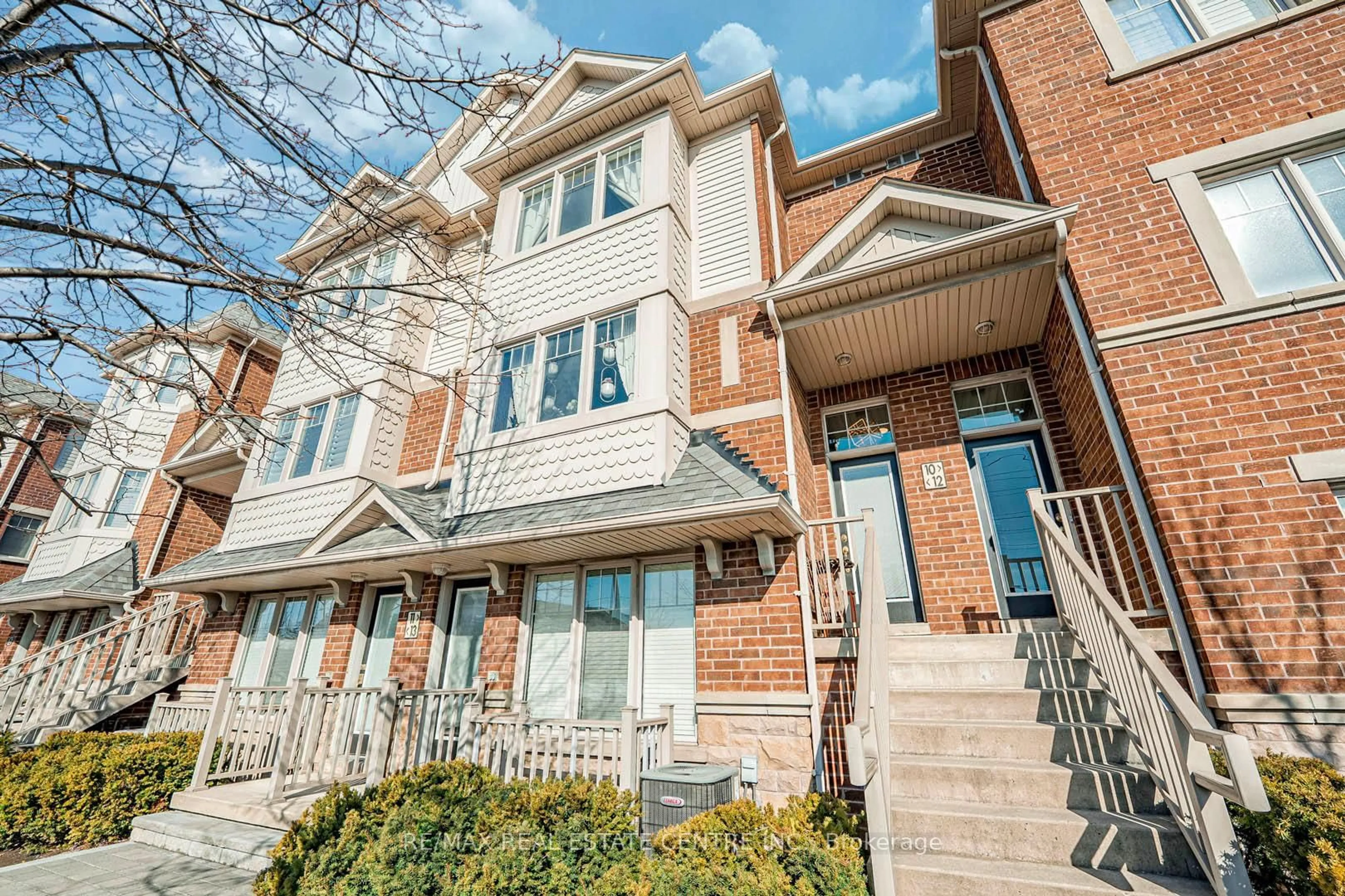 Home with brick exterior material, street for 3335 Thomas St #12, Mississauga Ontario L5M 0P7