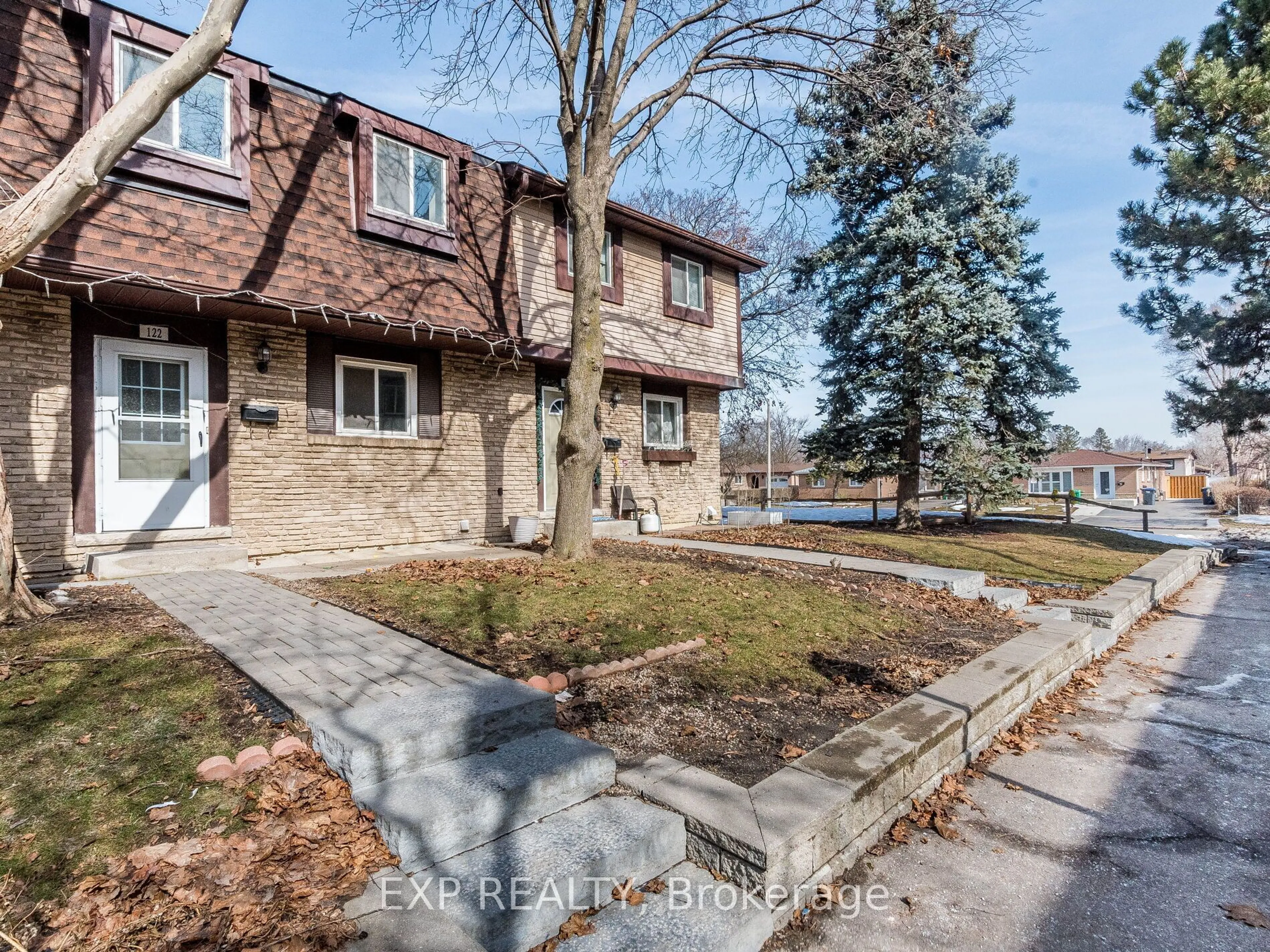 Home with brick exterior material, street for 45 Hansen Rd #122, Brampton Ontario L6V 3C5