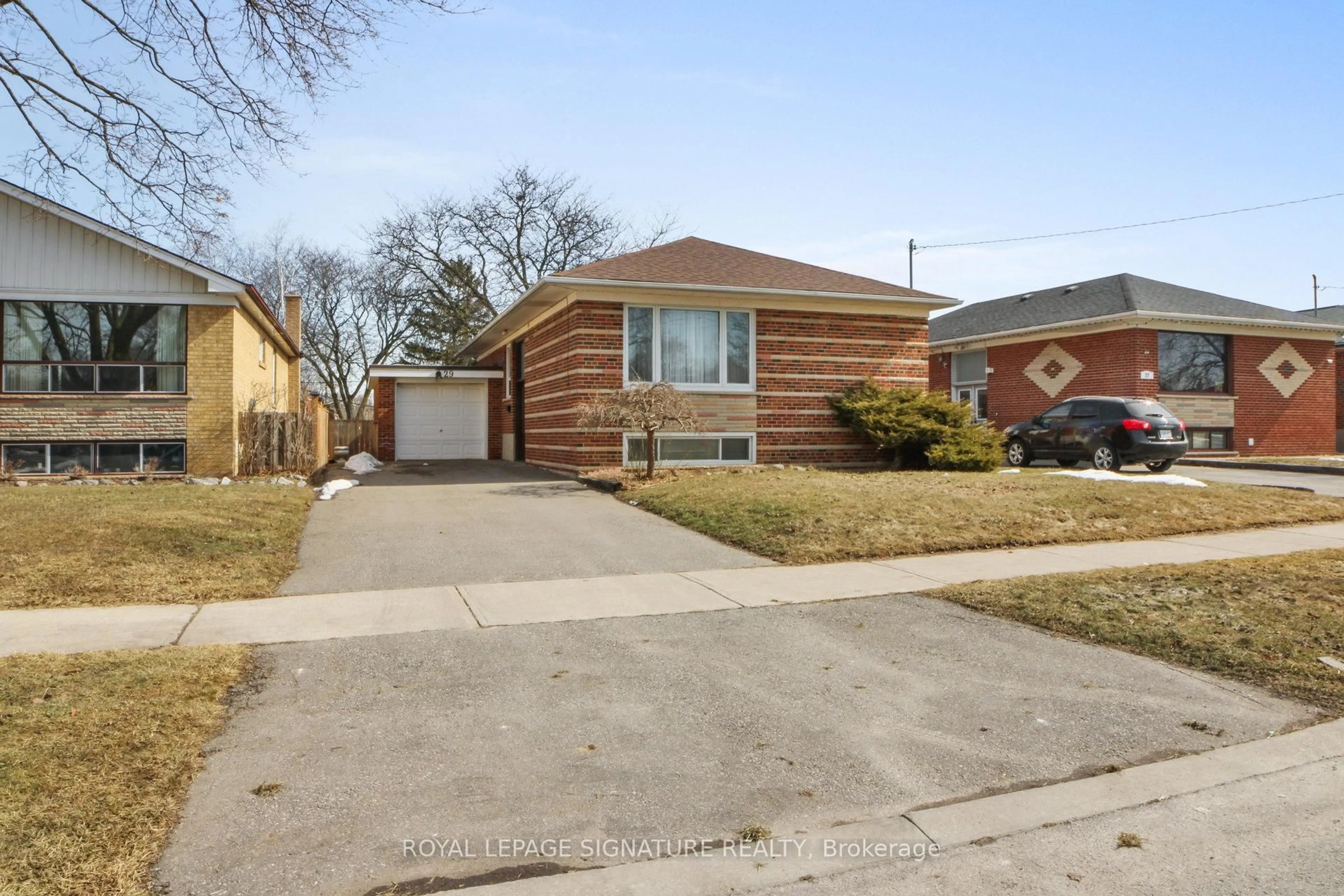 Home with brick exterior material, street for 29 Delsing Dr, Toronto Ontario M9W 4S7