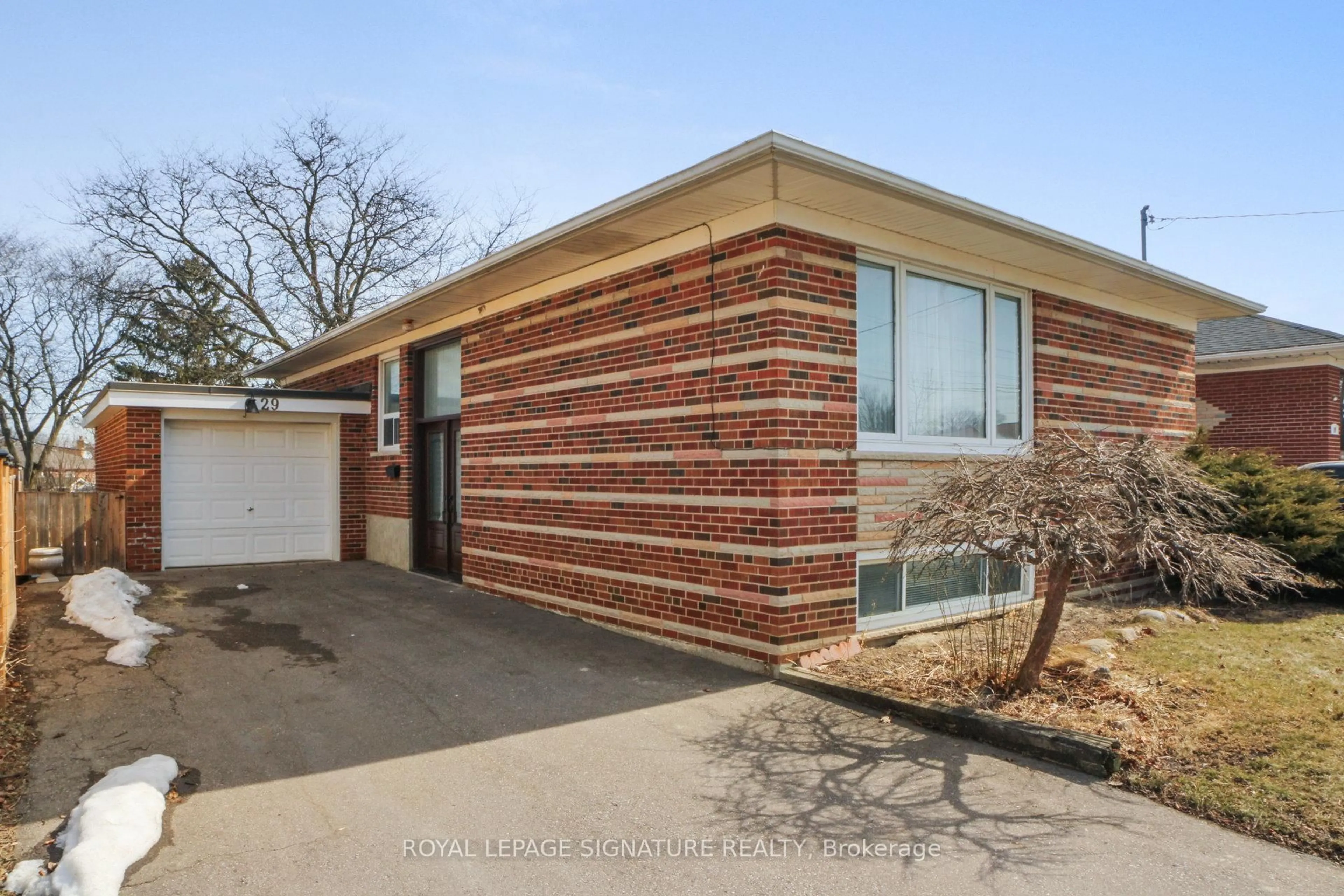 Home with brick exterior material, street for 29 Delsing Dr, Toronto Ontario M9W 4S7