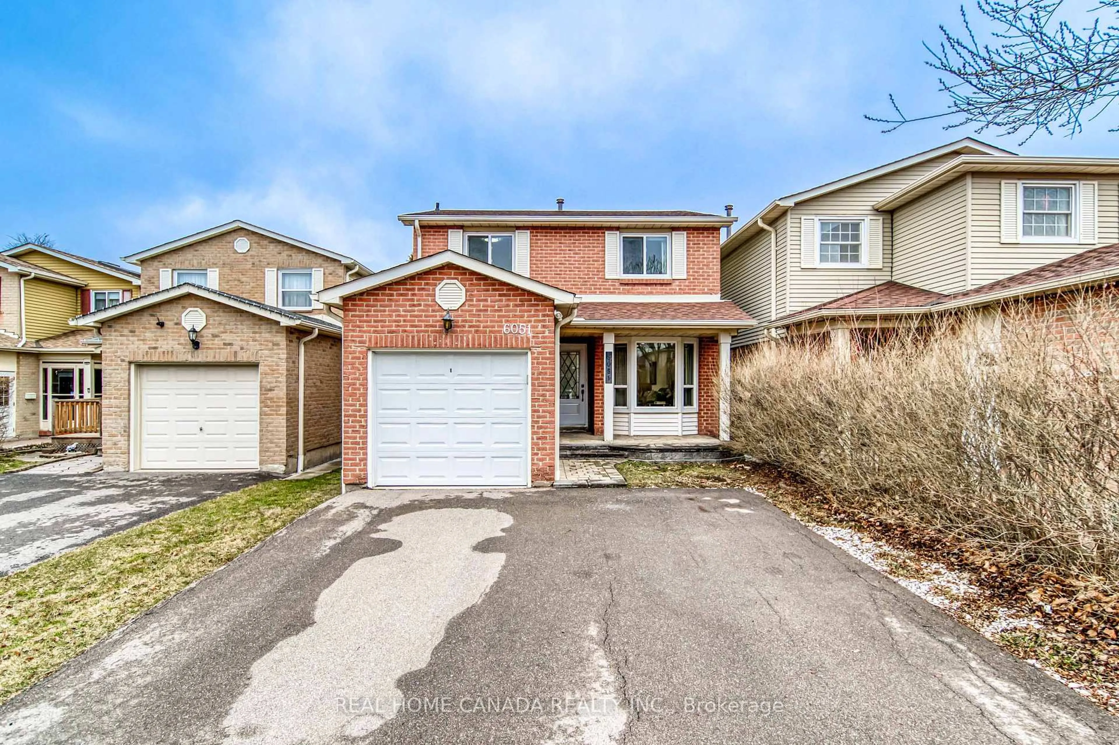 Home with brick exterior material, street for 6051 Fullerton Cres, Mississauga Ontario L5N 3A3