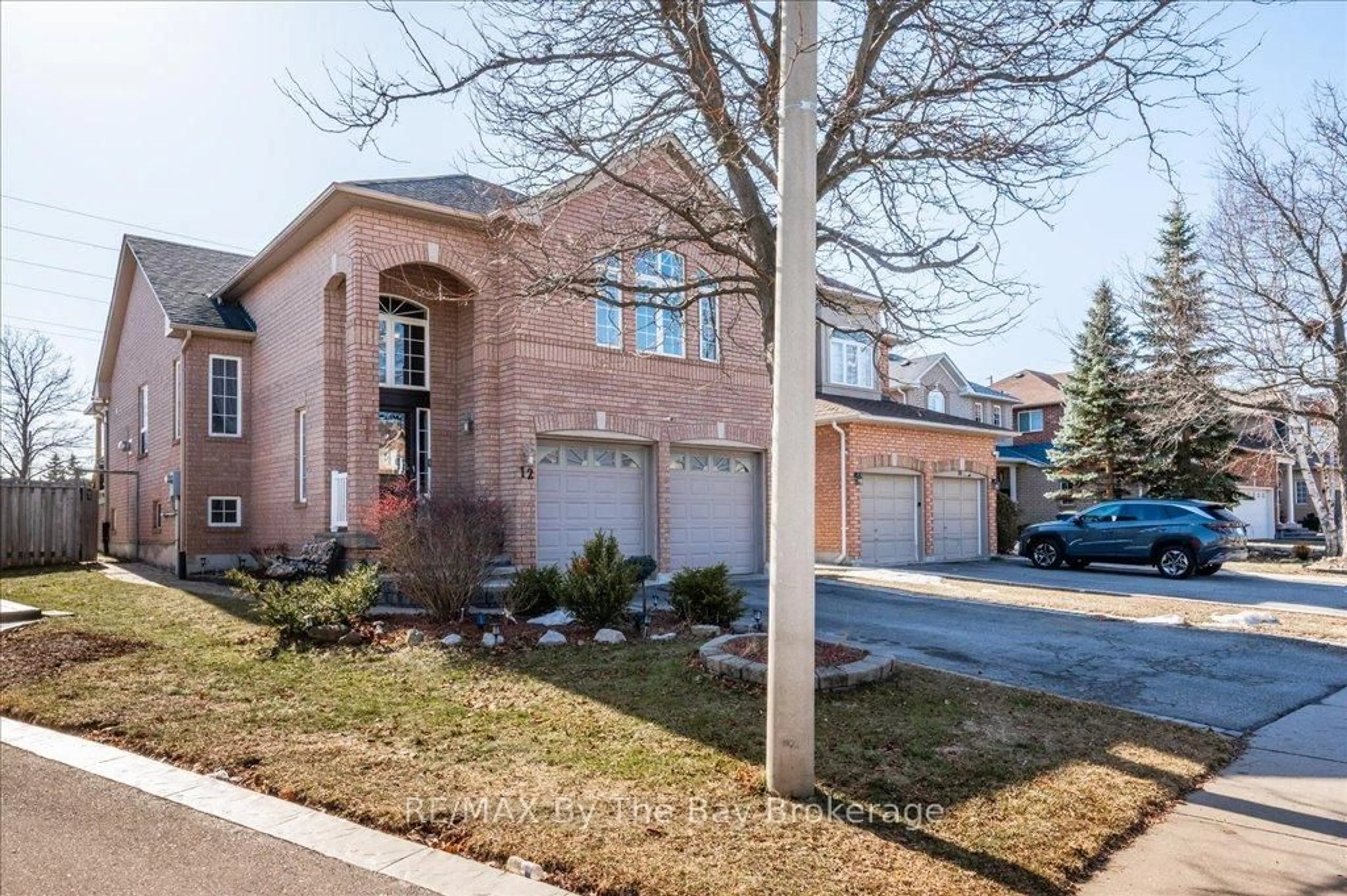 Home with brick exterior material, street for 12 Twin Willow Cres, Brampton Ontario L7A 1J9