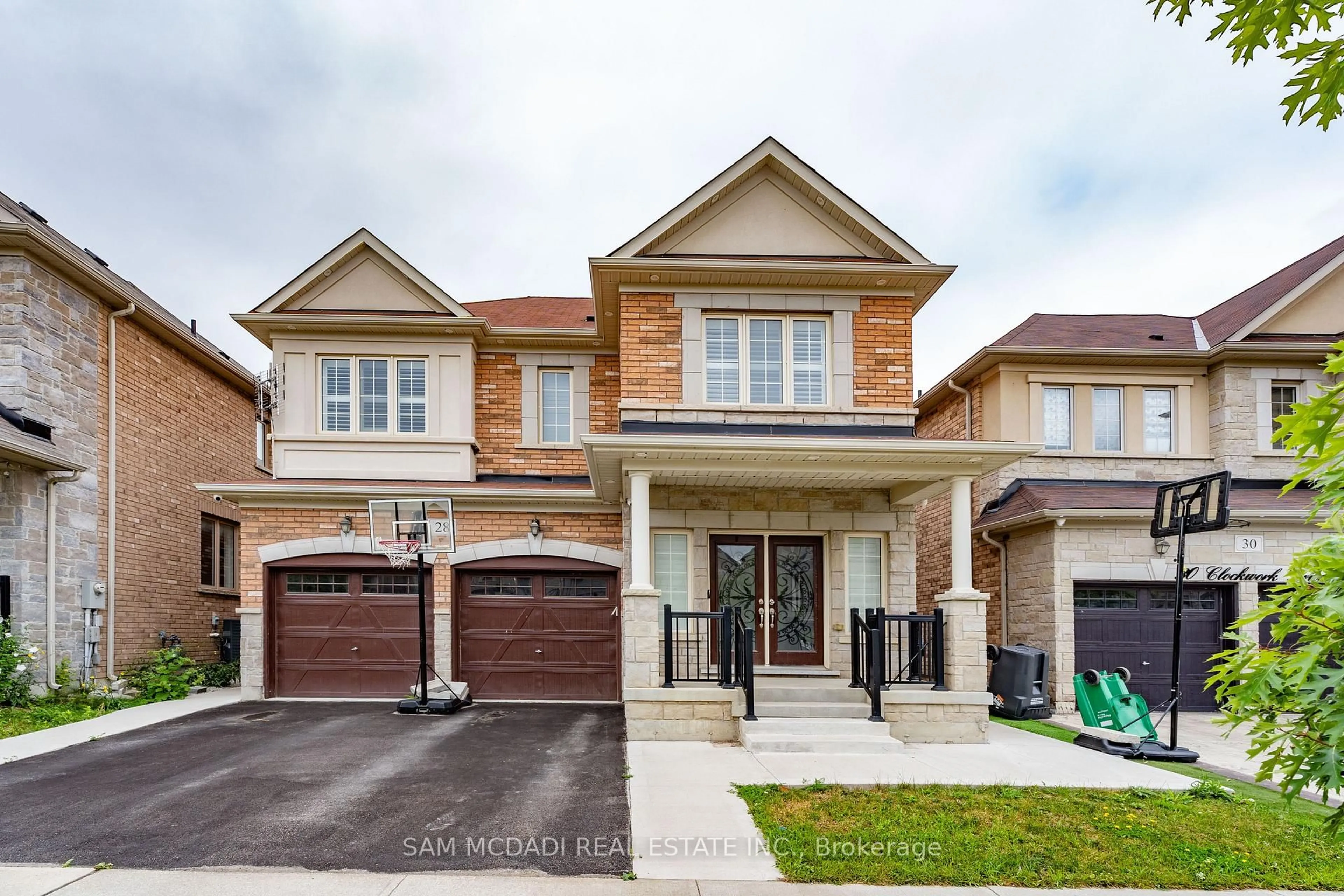 Home with brick exterior material, street for 28 Clockwork Dr, Brampton Ontario L7A 4R8