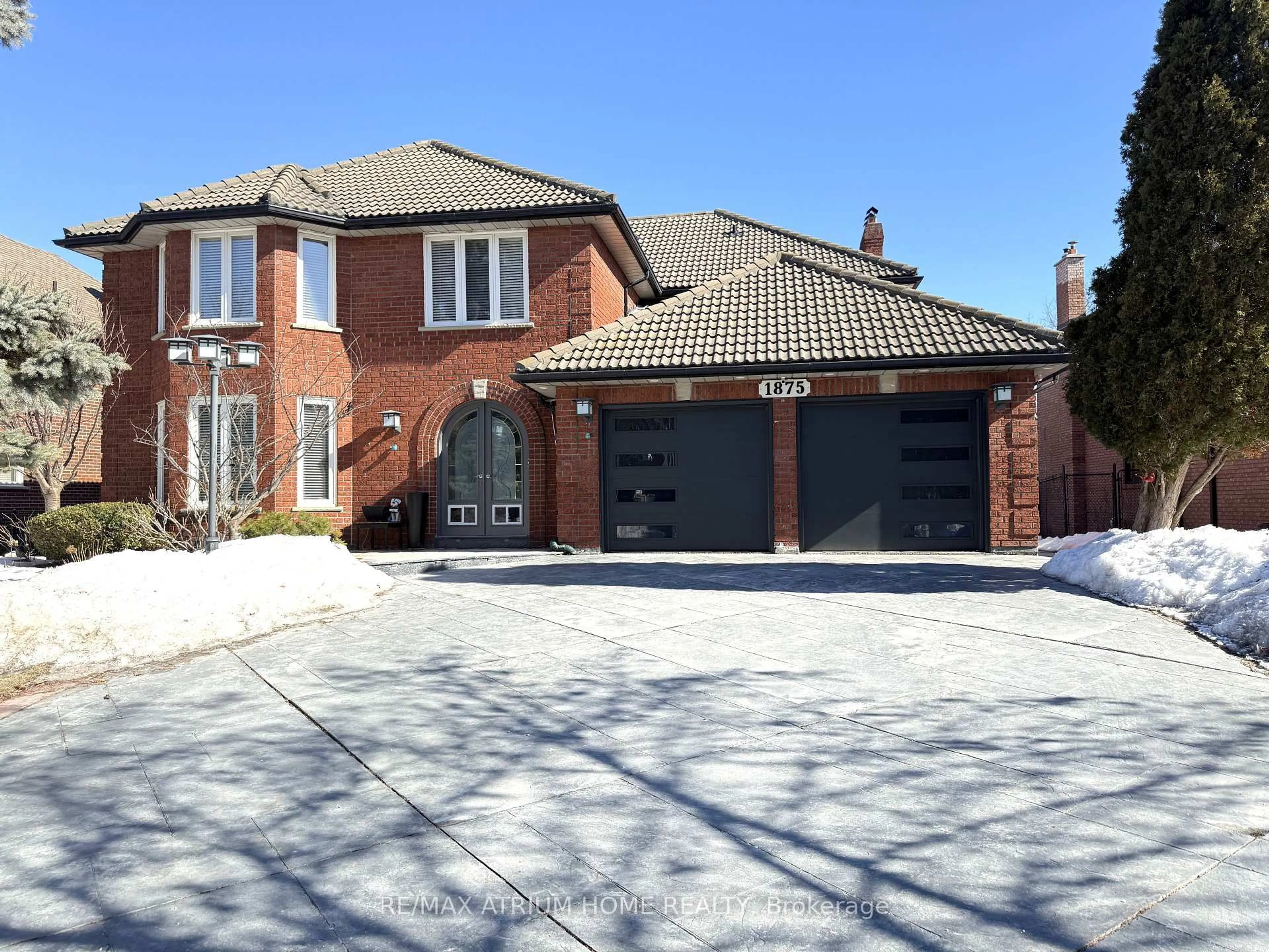 Home with brick exterior material, street for 1875 Folkway Dr, Mississauga Ontario L5L 2X1