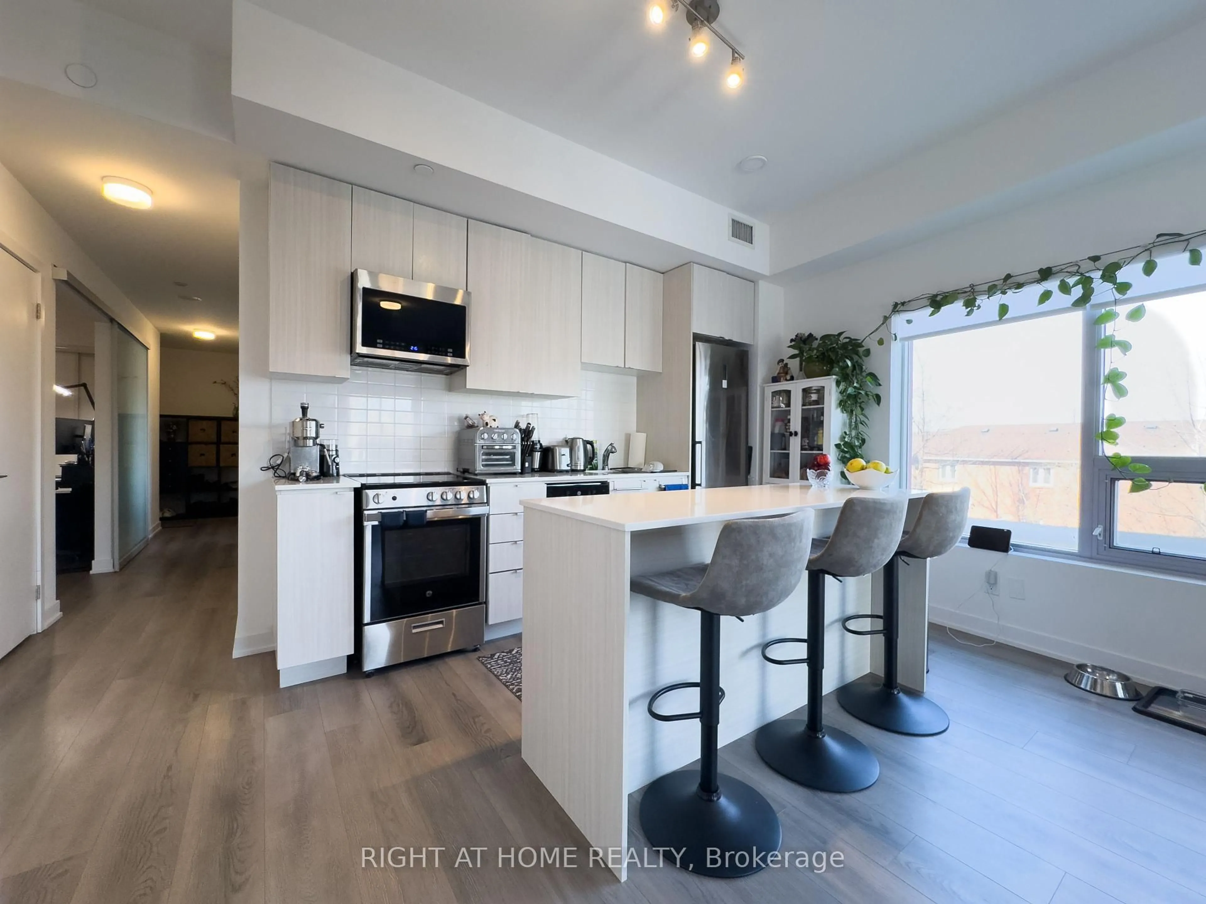 Open concept kitchen, unknown for 2433 Dufferin St #211, Toronto Ontario M6E 0B4