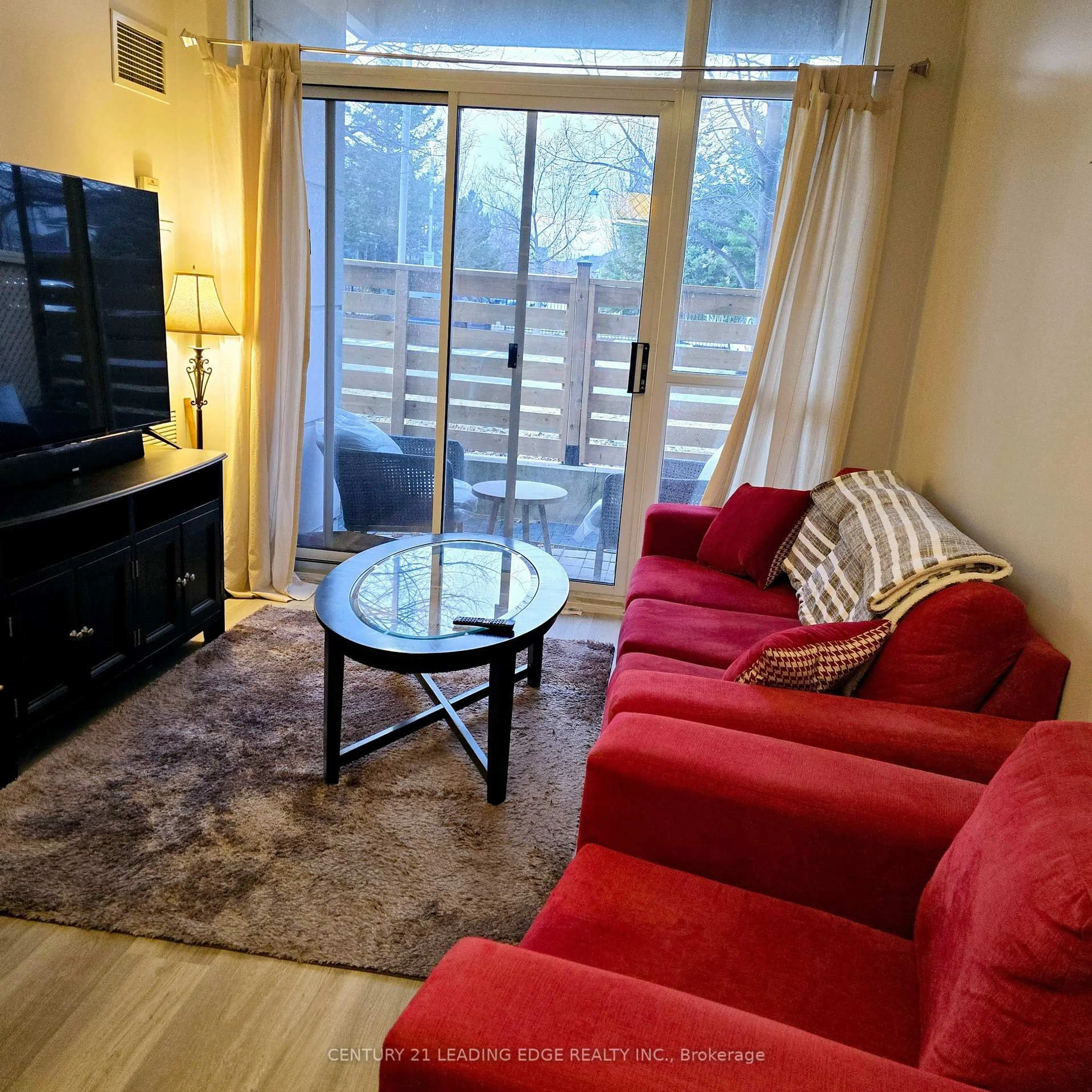 Living room with furniture, unknown for 2325 Central Park Dr #103, Oakville Ontario L6H 0E2