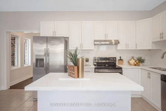 Additional property image - 6563 Song Bird Cres