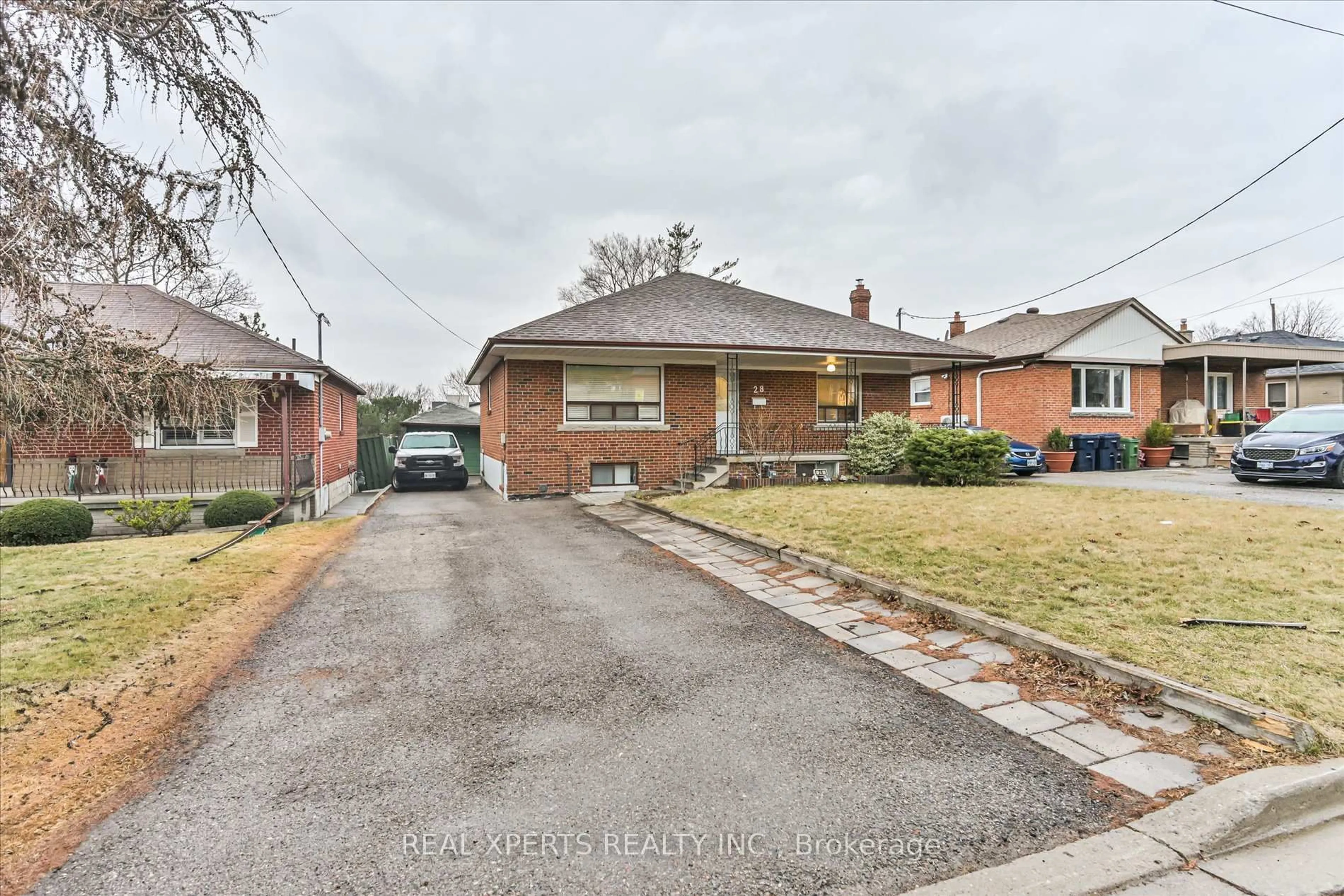 Home with brick exterior material, street for 28 Clevedon St, Toronto Ontario M3M 1M4