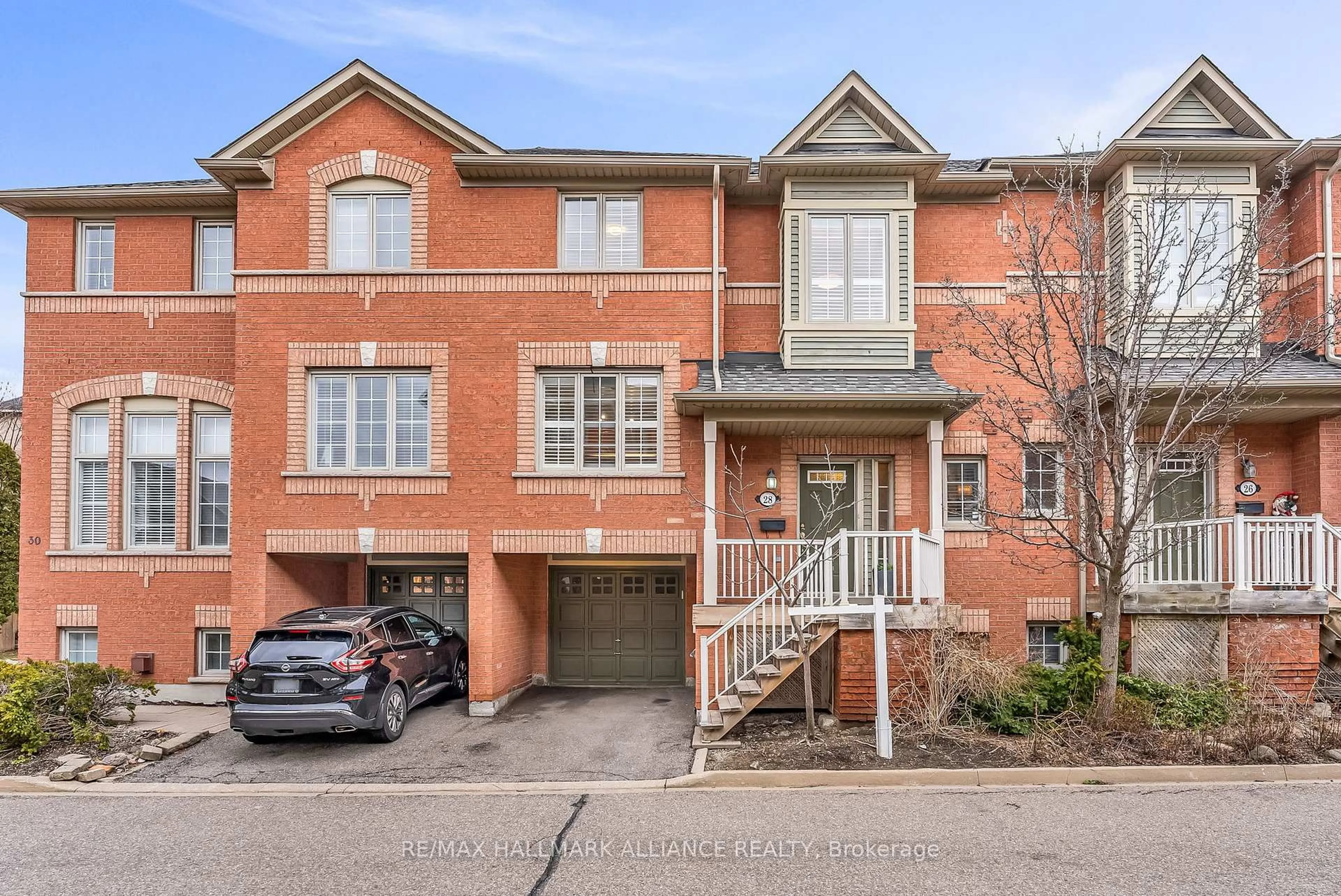 Home with brick exterior material, street for 5031 East Mill Rd #28, Mississauga Ontario L5V 2M5