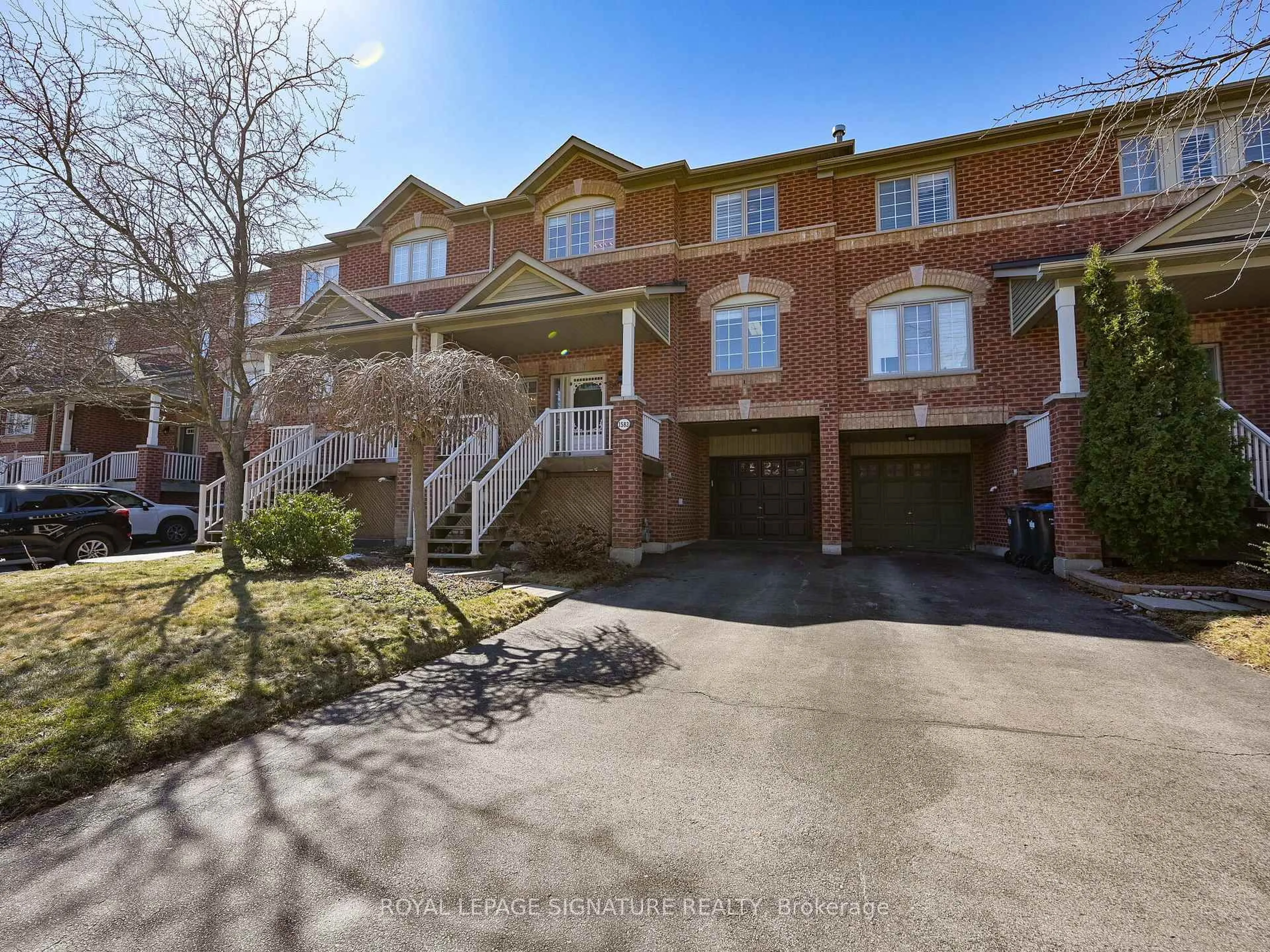 Home with brick exterior material, street for 1583 Woodhenge Way, Mississauga Ontario L5N 7T1