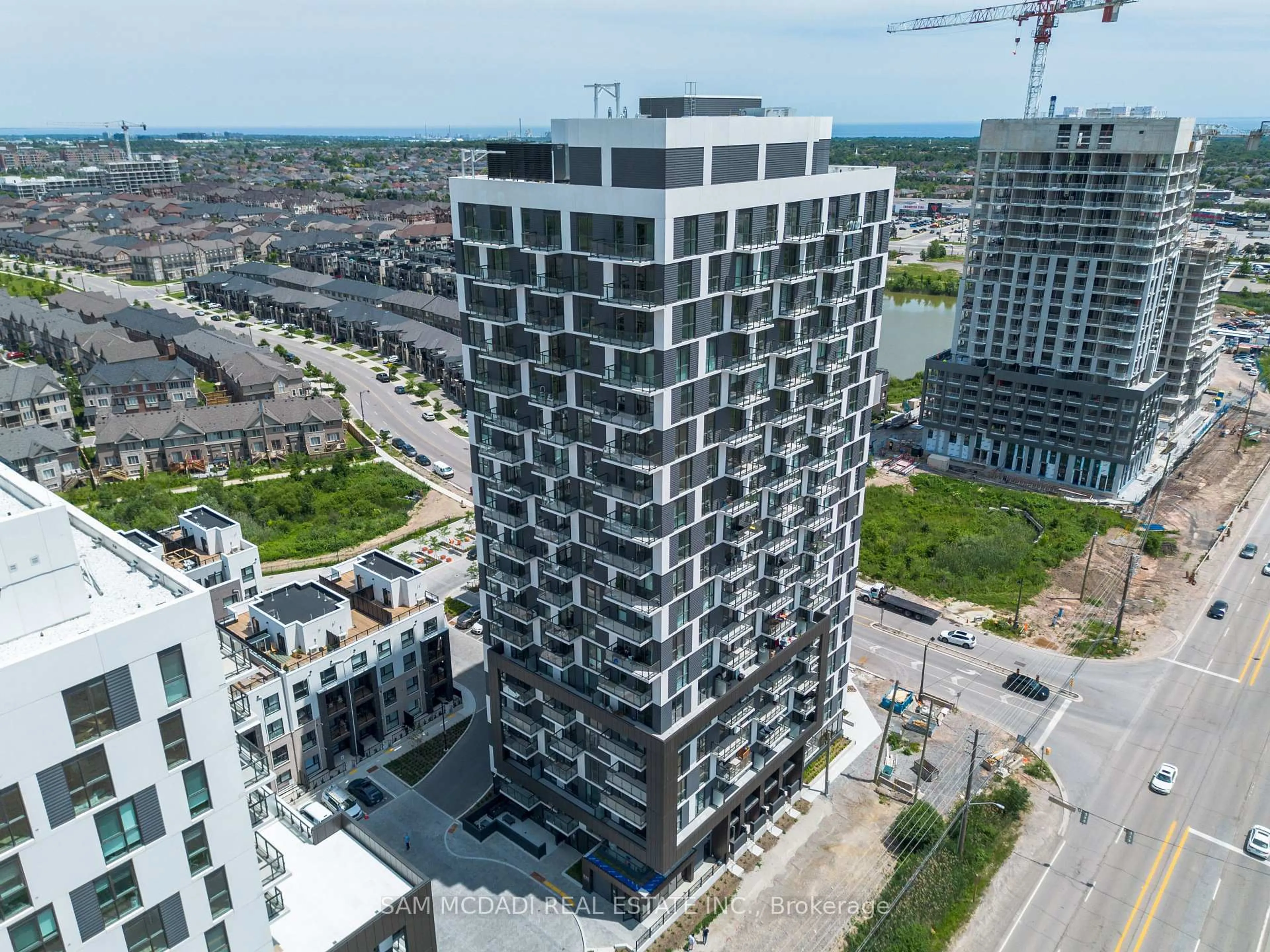 A pic from outside/outdoor area/front of a property/back of a property/a pic from drone, city buildings view from balcony for 335 Wheat Boom Dr #1508, Oakville Ontario L6H 7Y1