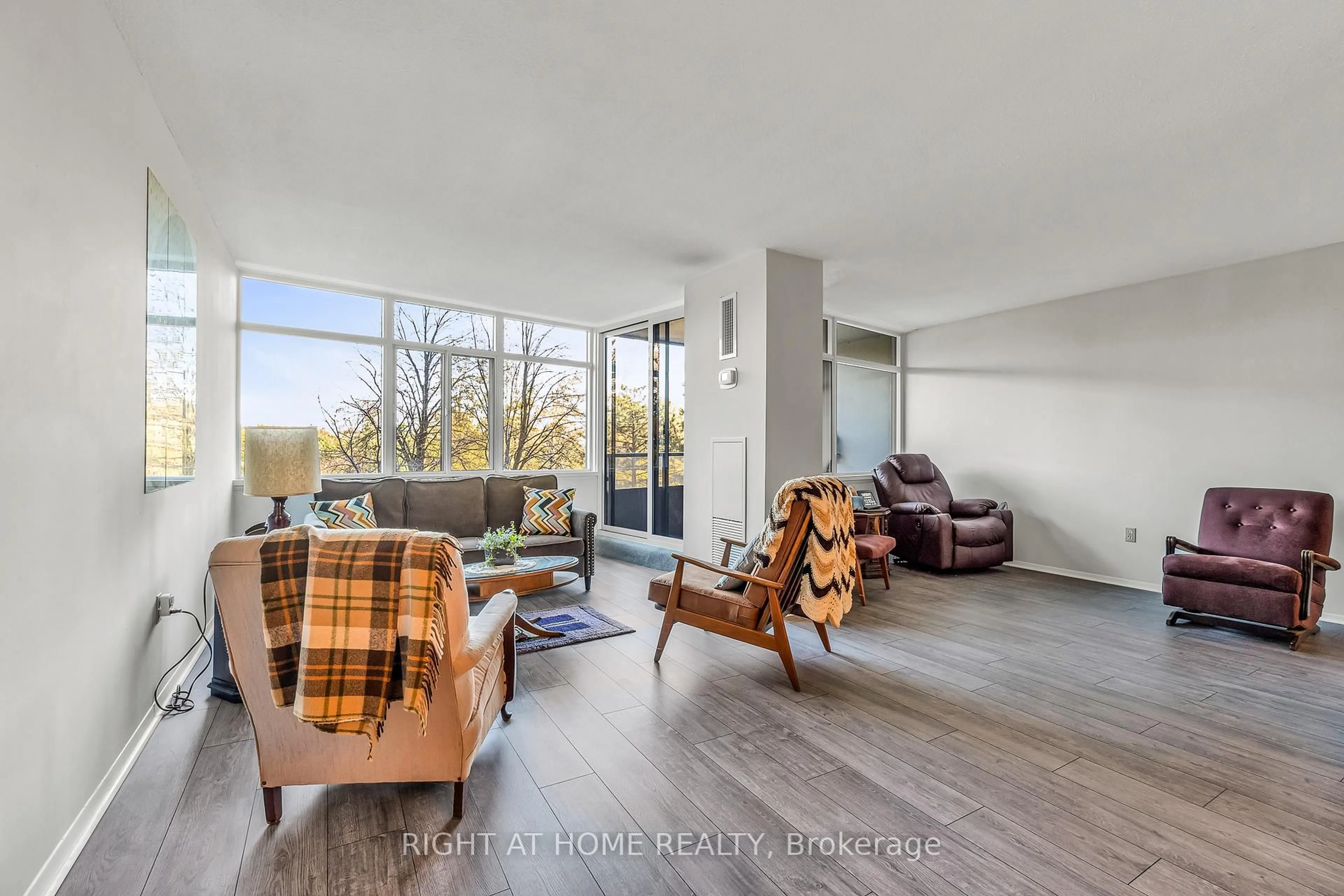 Living room with furniture, unknown for 3100 Kirwin Ave #308, Mississauga Ontario L5A 3S6