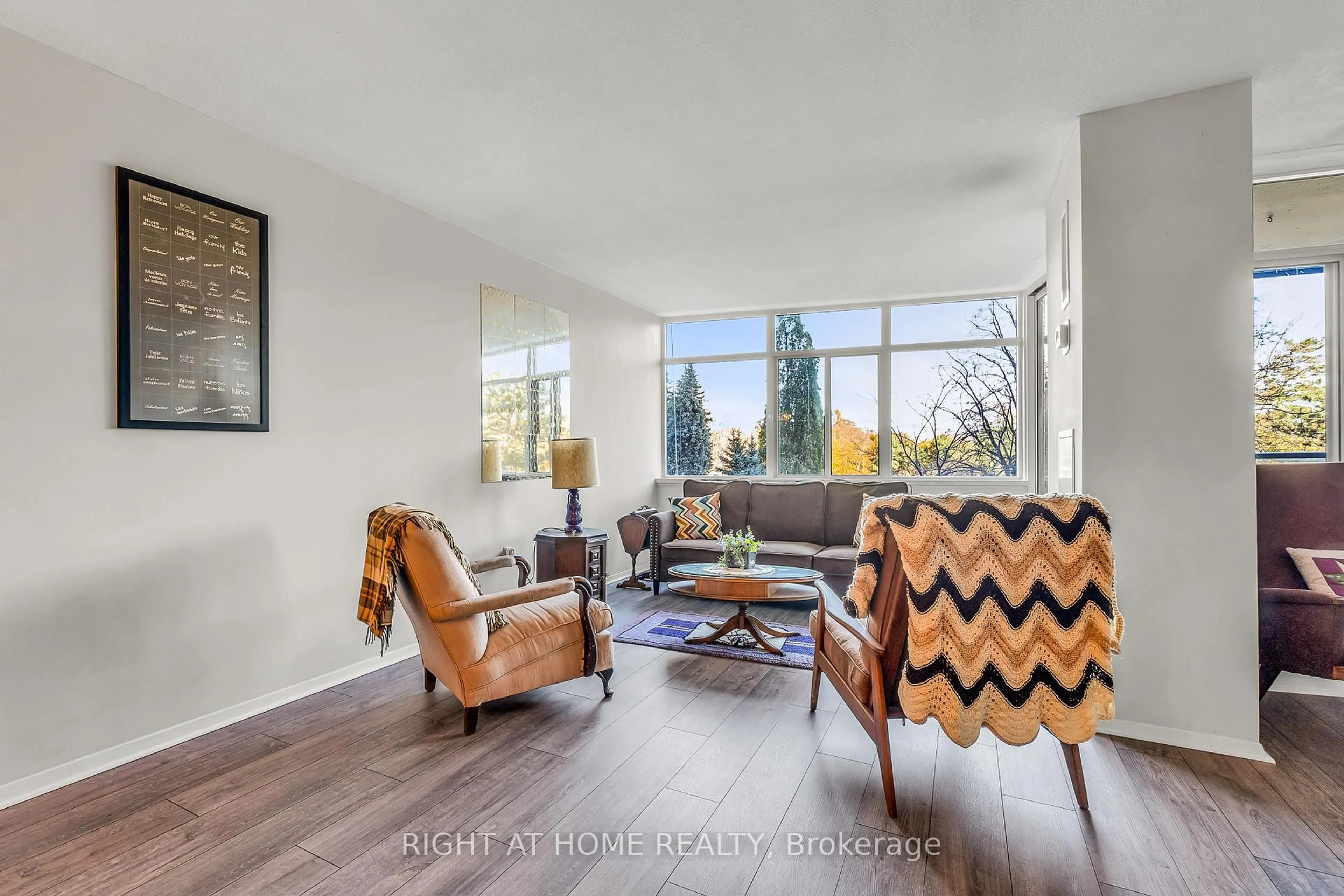 Living room with furniture, unknown for 3100 Kirwin Ave #308, Mississauga Ontario L5A 3S6