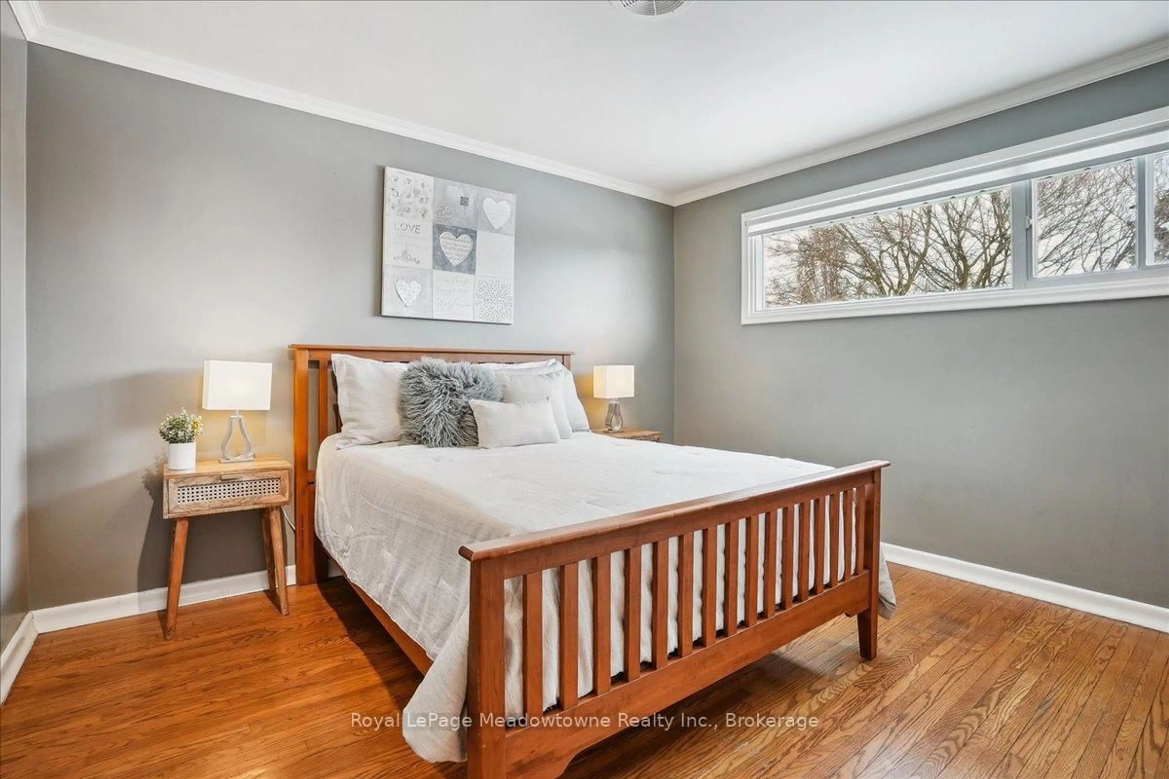 Bedroom with bed, wood/laminate floor for 12840 Britannia Rd, Milton Ontario L9E 0V3