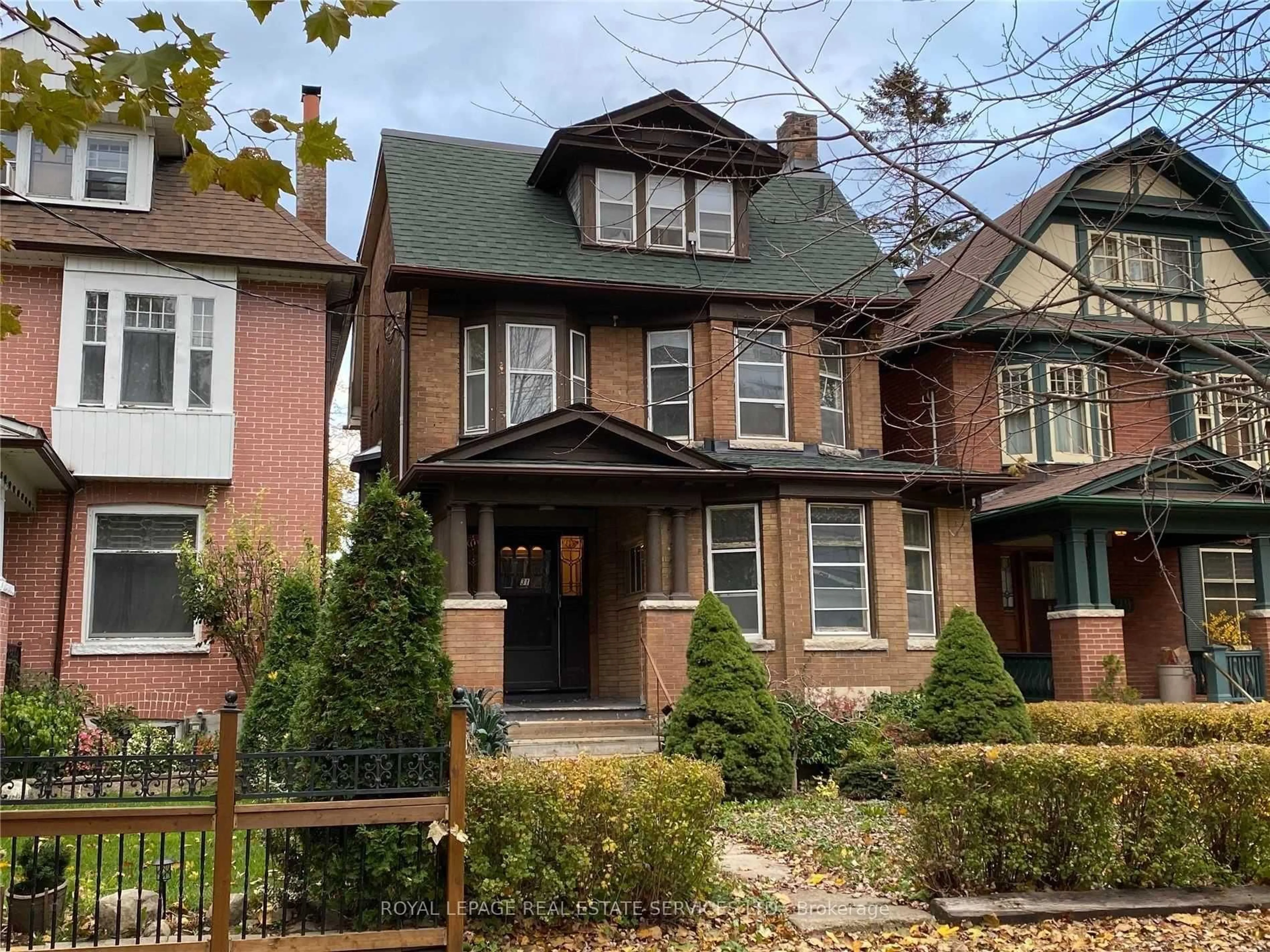 Home with brick exterior material, street for 31 Tyndall Ave, Toronto Ontario M6K 2E9