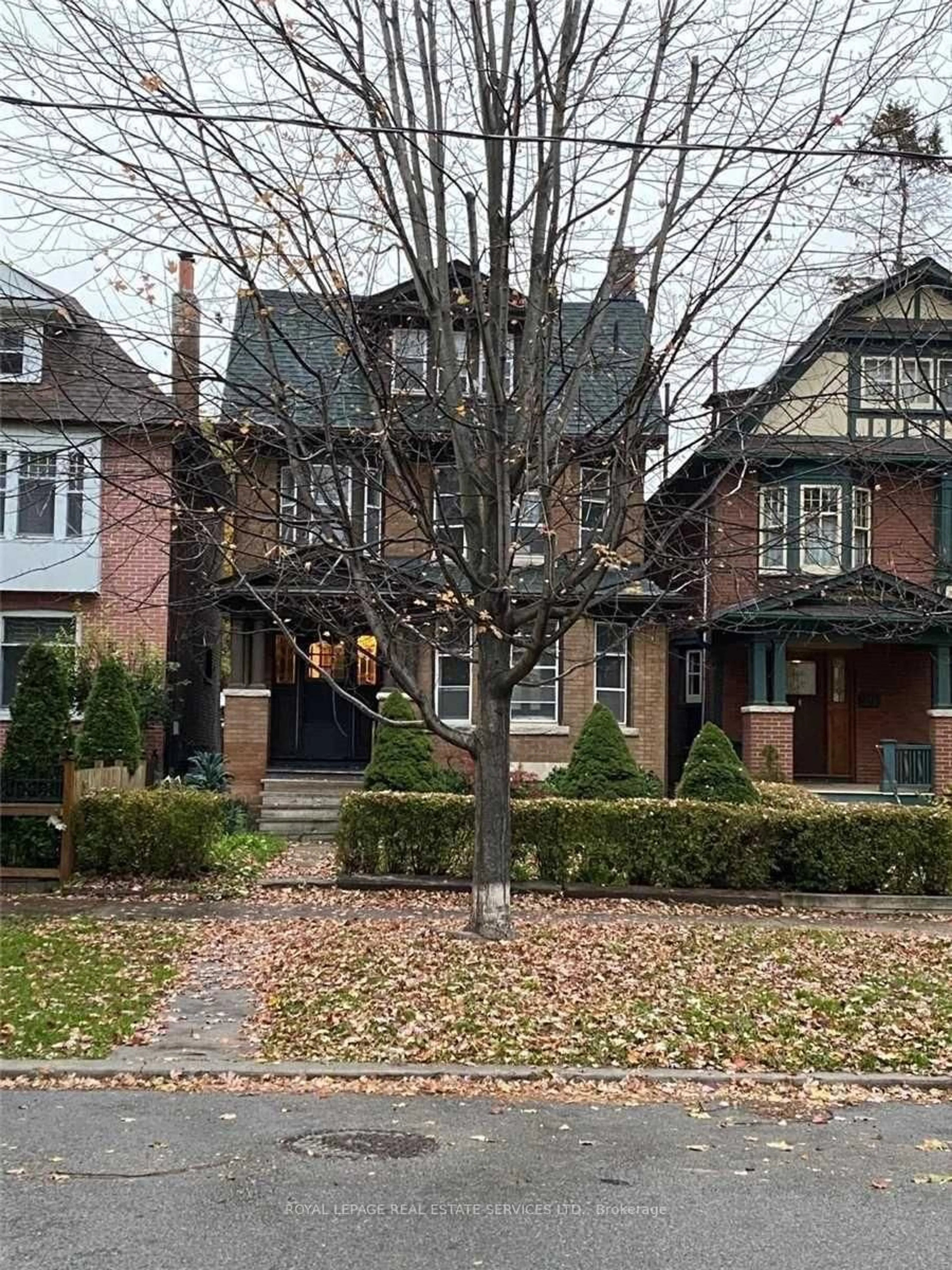 Home with brick exterior material, street for 31 Tyndall Ave, Toronto Ontario M6K 2E9