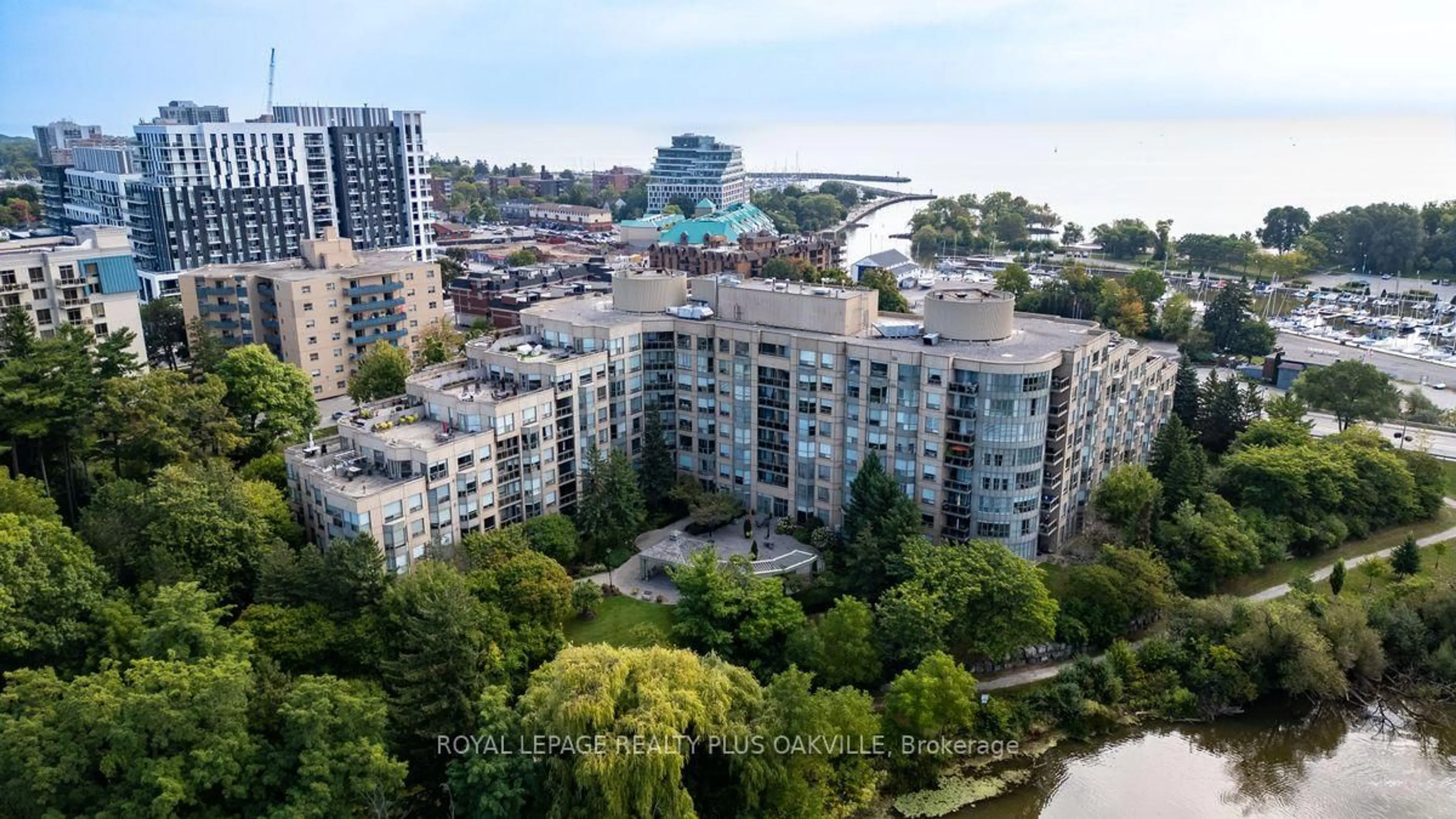 A pic from outside/outdoor area/front of a property/back of a property/a pic from drone, city buildings view from balcony for 2511 Lakeshore Rd #517, Oakville Ontario L6L 6L9