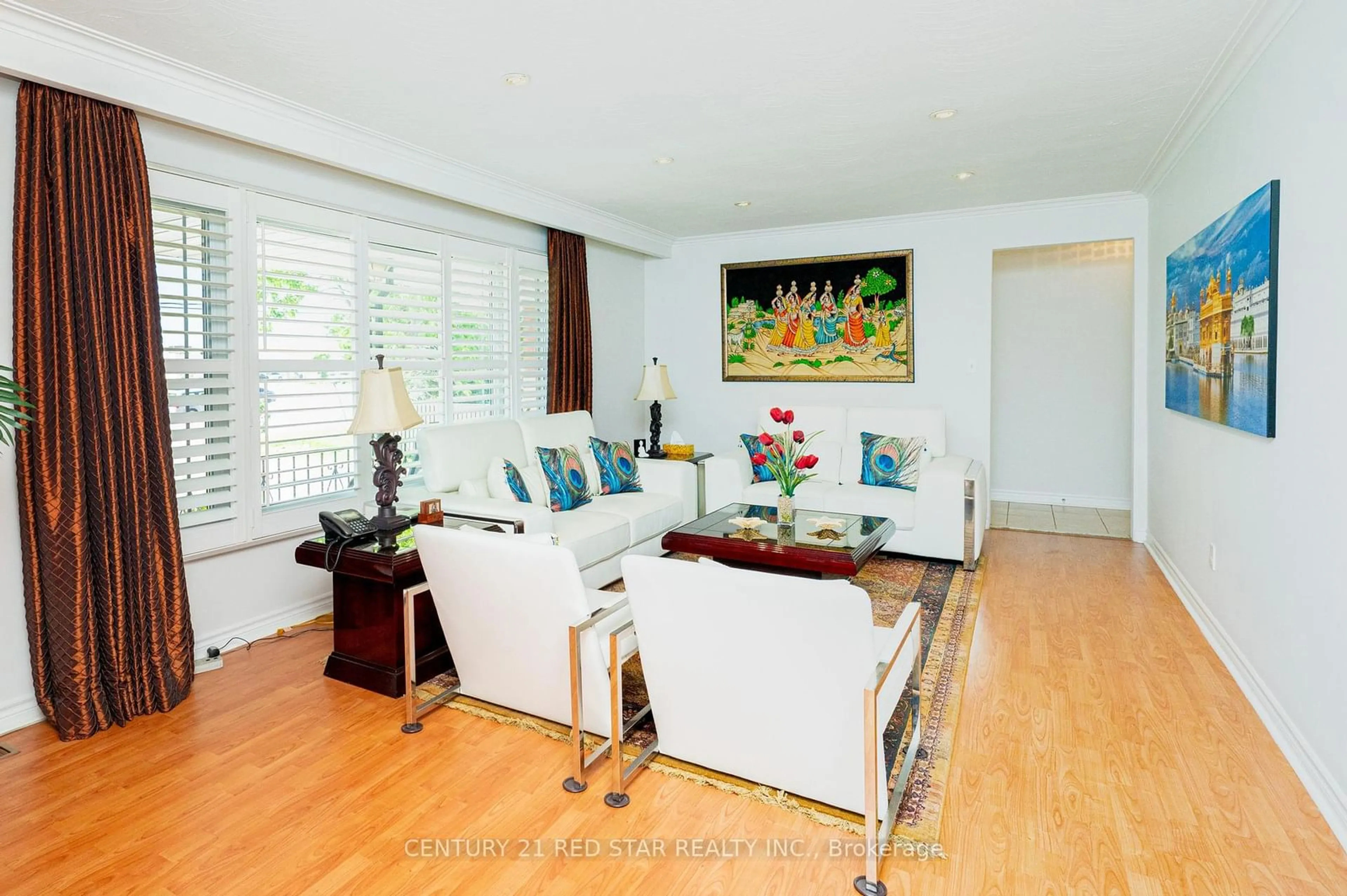 Living room with furniture, wood/laminate floor for 5955 Mayfield Rd, Brampton Ontario L6R 0A8