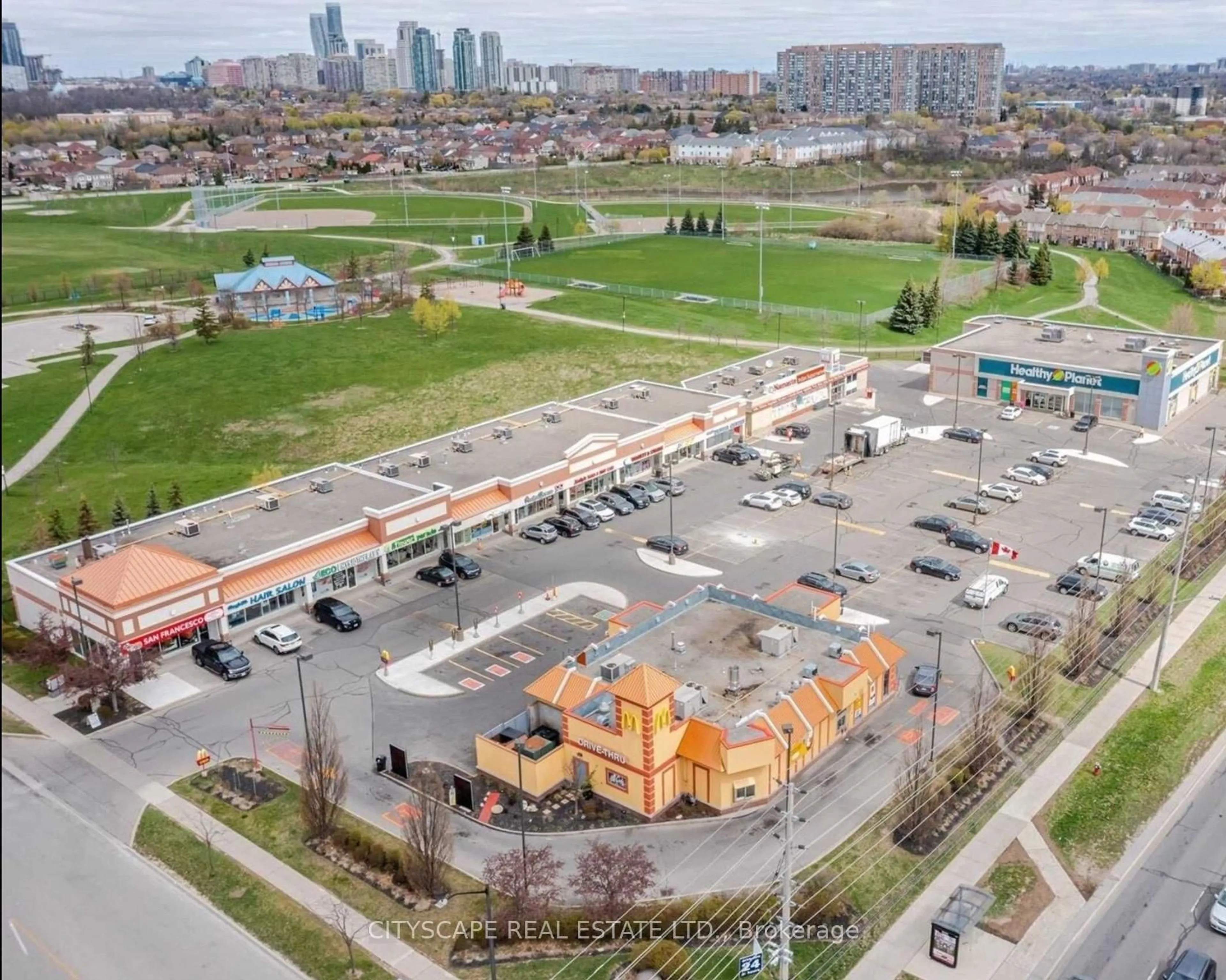 A pic from outside/outdoor area/front of a property/back of a property/a pic from drone, street for 634 Shoreline Dr #4, Mississauga Ontario L5B 0A7