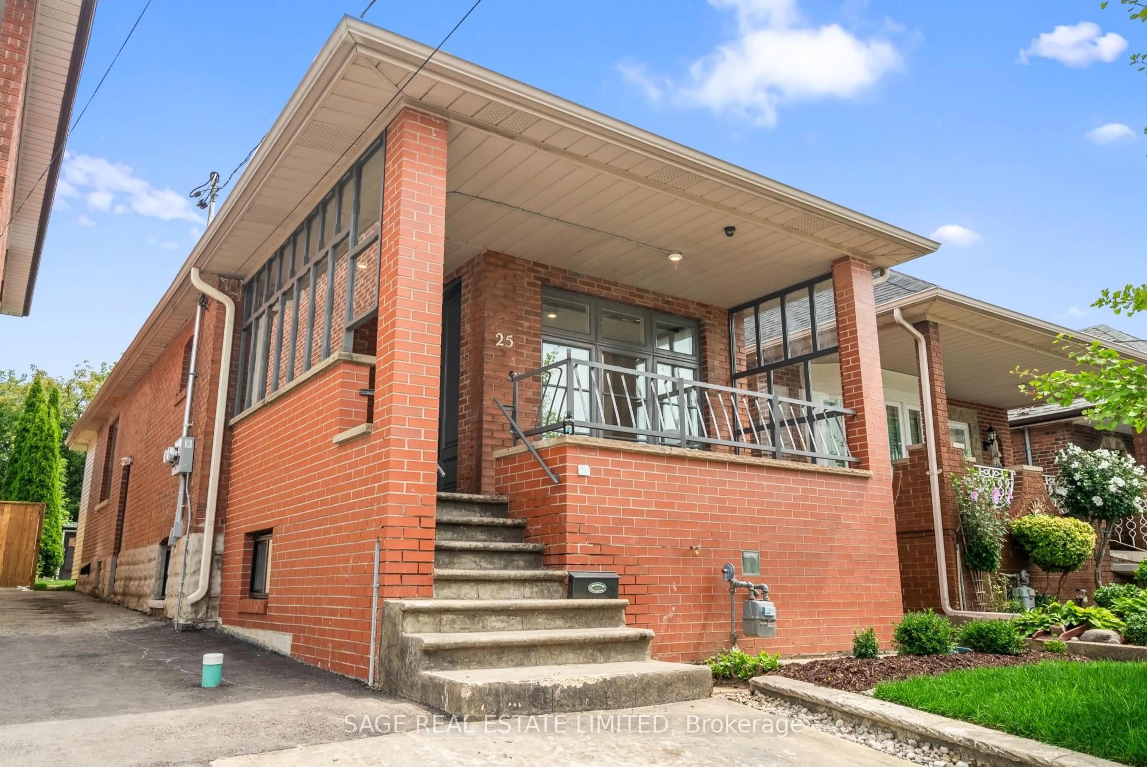 Home with brick exterior material, building for 25 Chamberlain Ave, Toronto Ontario M6E 4J7