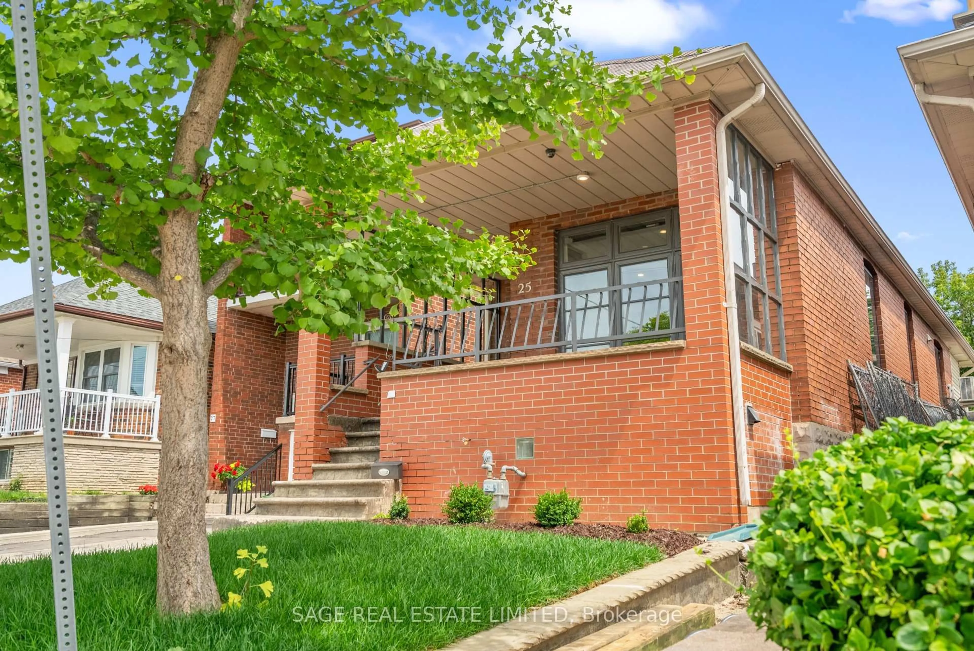 Home with brick exterior material, street for 25 Chamberlain Ave, Toronto Ontario M6E 4J7
