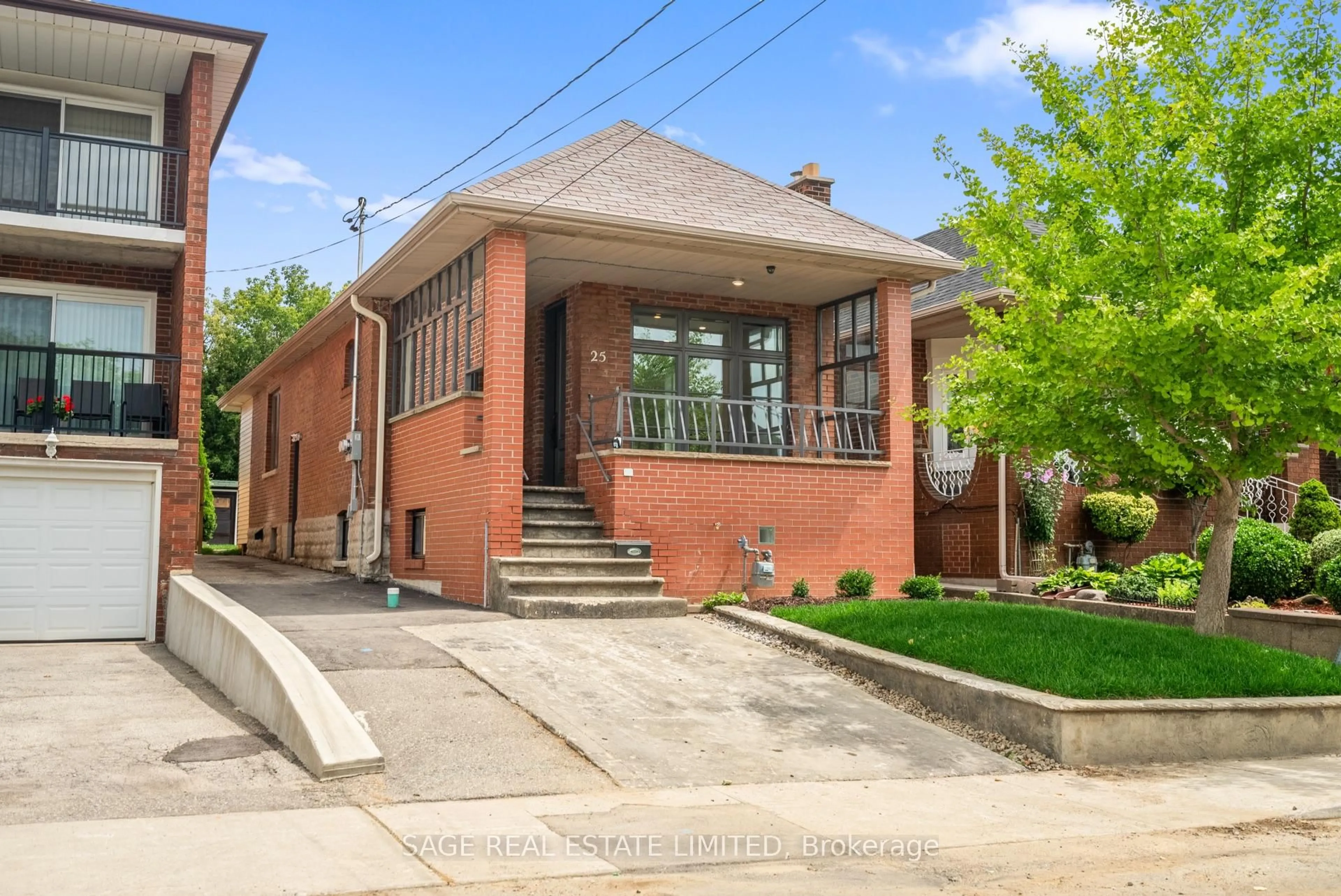 Home with brick exterior material, street for 25 Chamberlain Ave, Toronto Ontario M6E 4J7