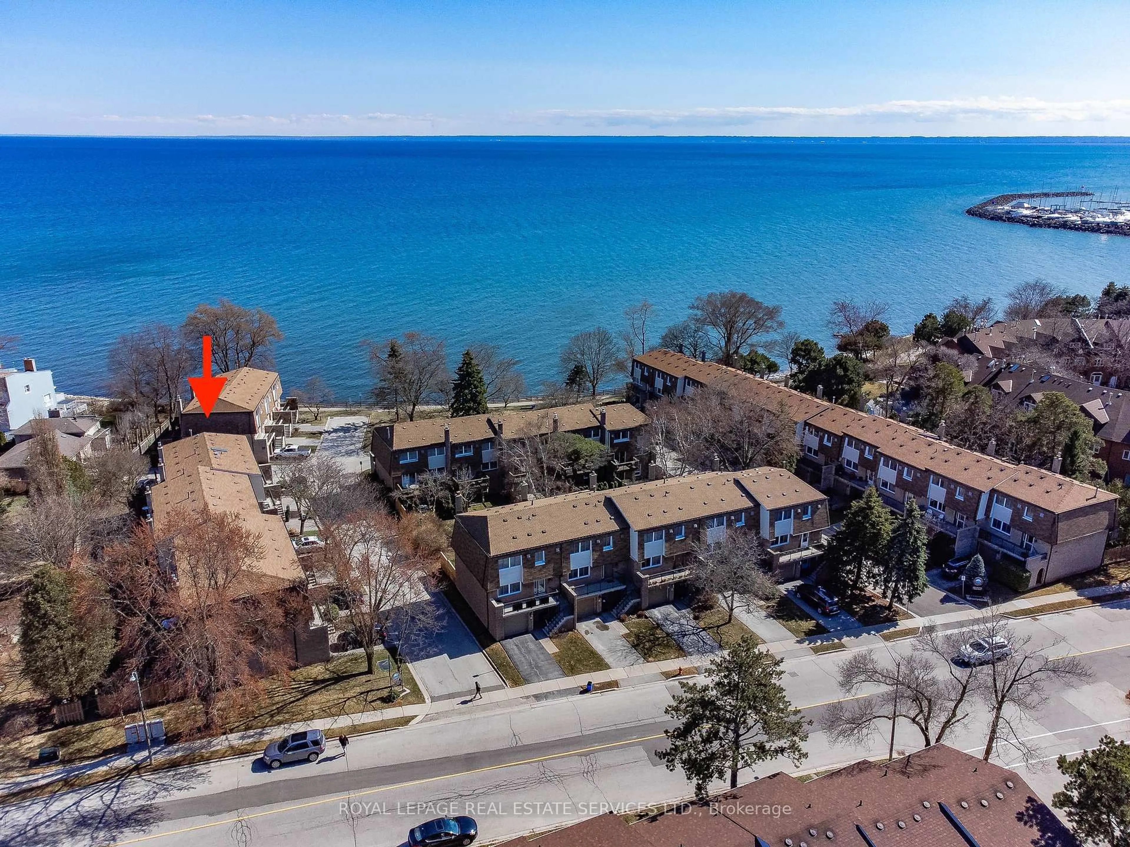 A pic from outside/outdoor area/front of a property/back of a property/a pic from drone, water/lake/river/ocean view for 2098 Marine Dr #6, Oakville Ontario L6L 1B7
