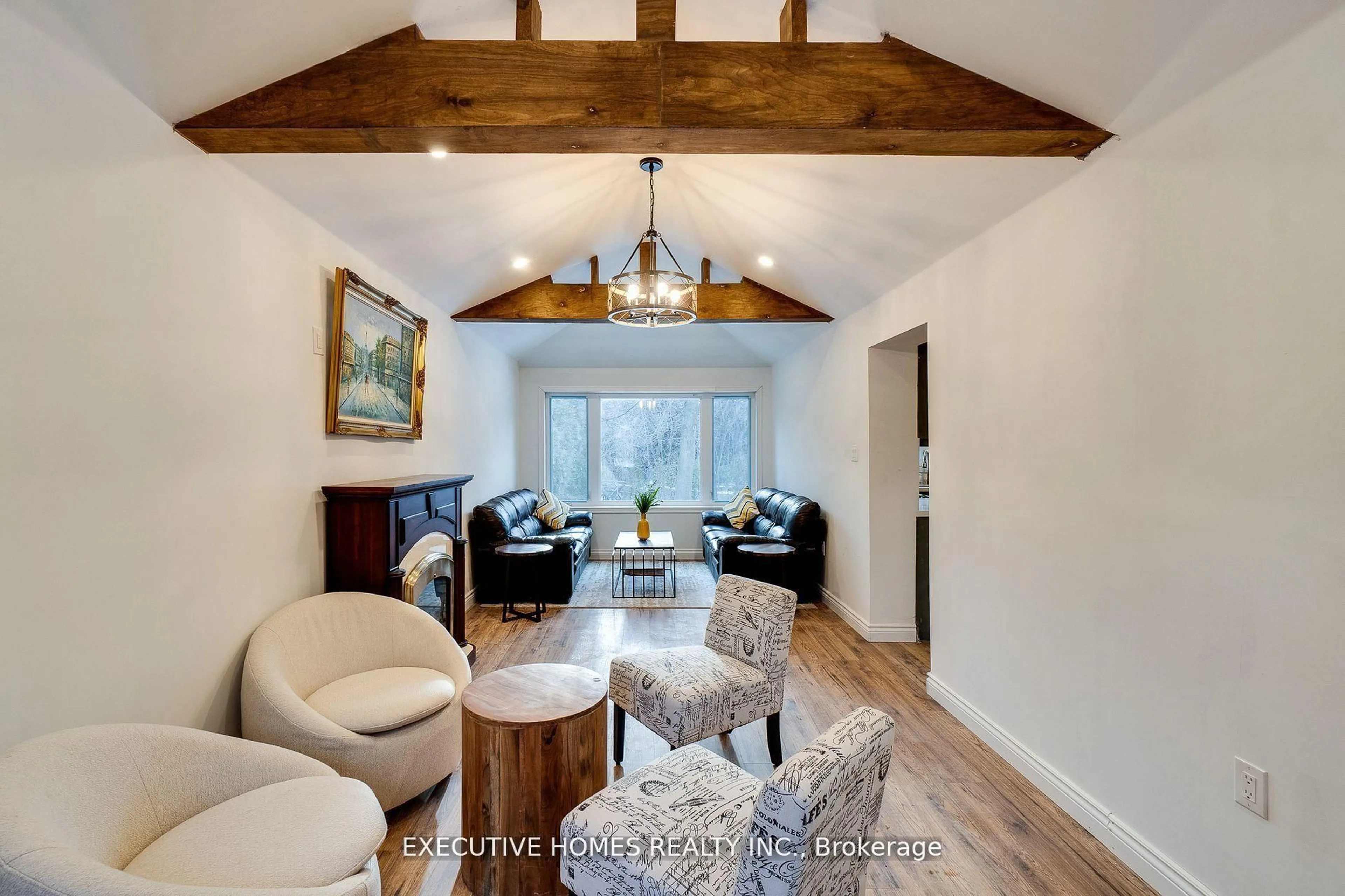 Living room with furniture, wood/laminate floor for 208 Glen Oak Dr, Oakville Ontario L6K 2J2