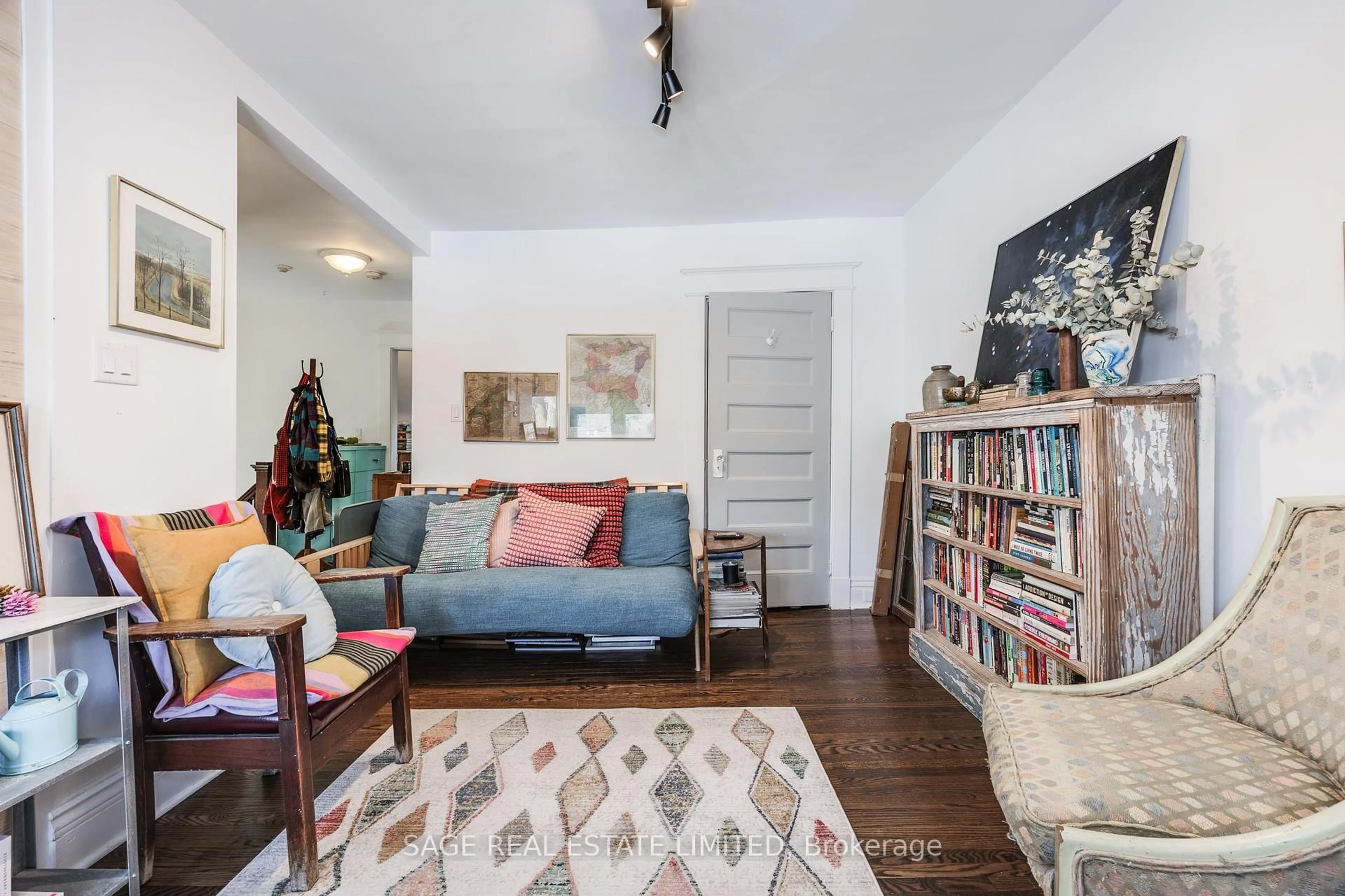 Living room with furniture, wood/laminate floor for 21 Macdonell Ave, Toronto Ontario M6R 2A3