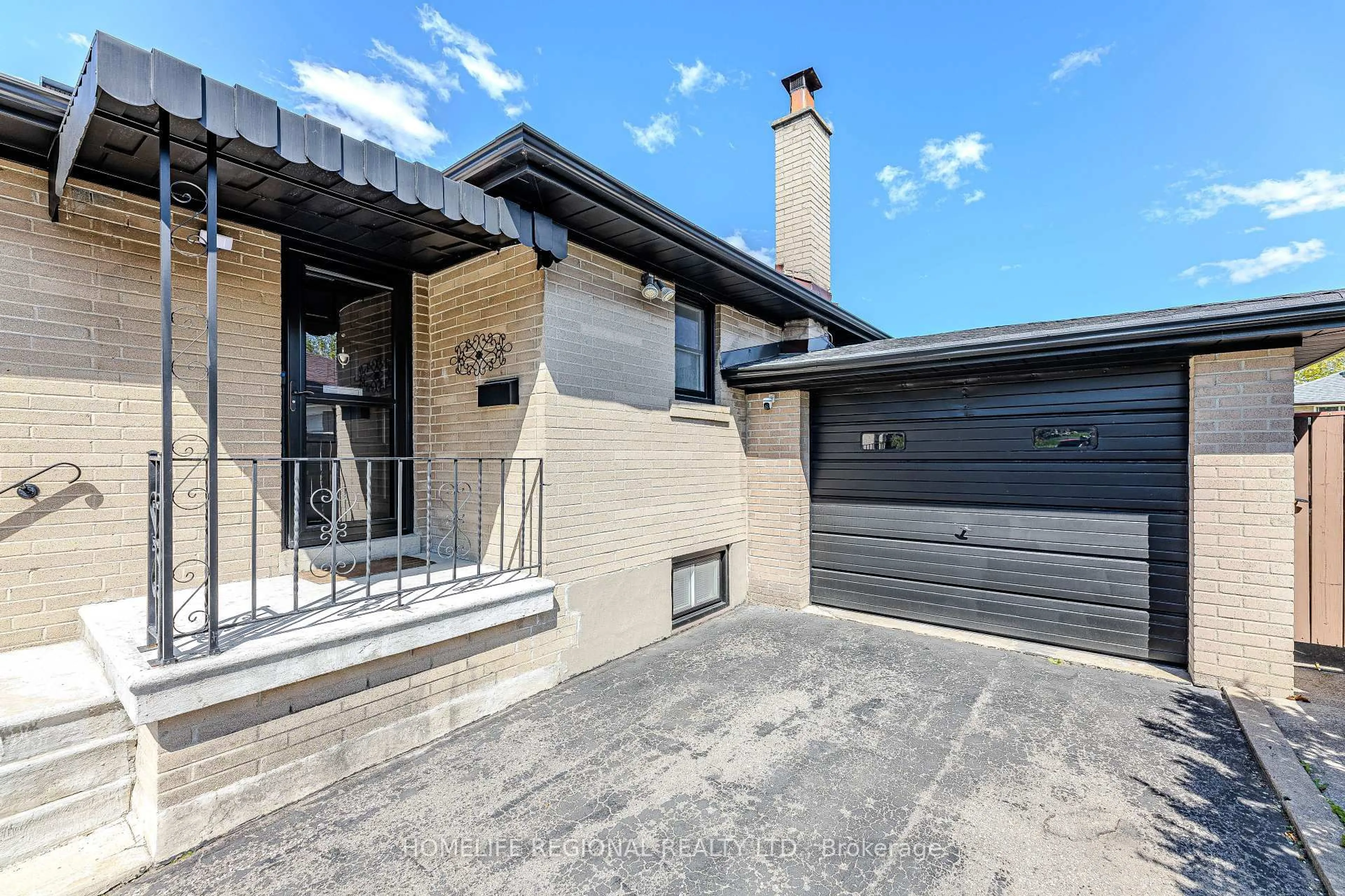 Home with brick exterior material, street for 132 Wyndale Dr, Toronto Ontario M6L 1G3